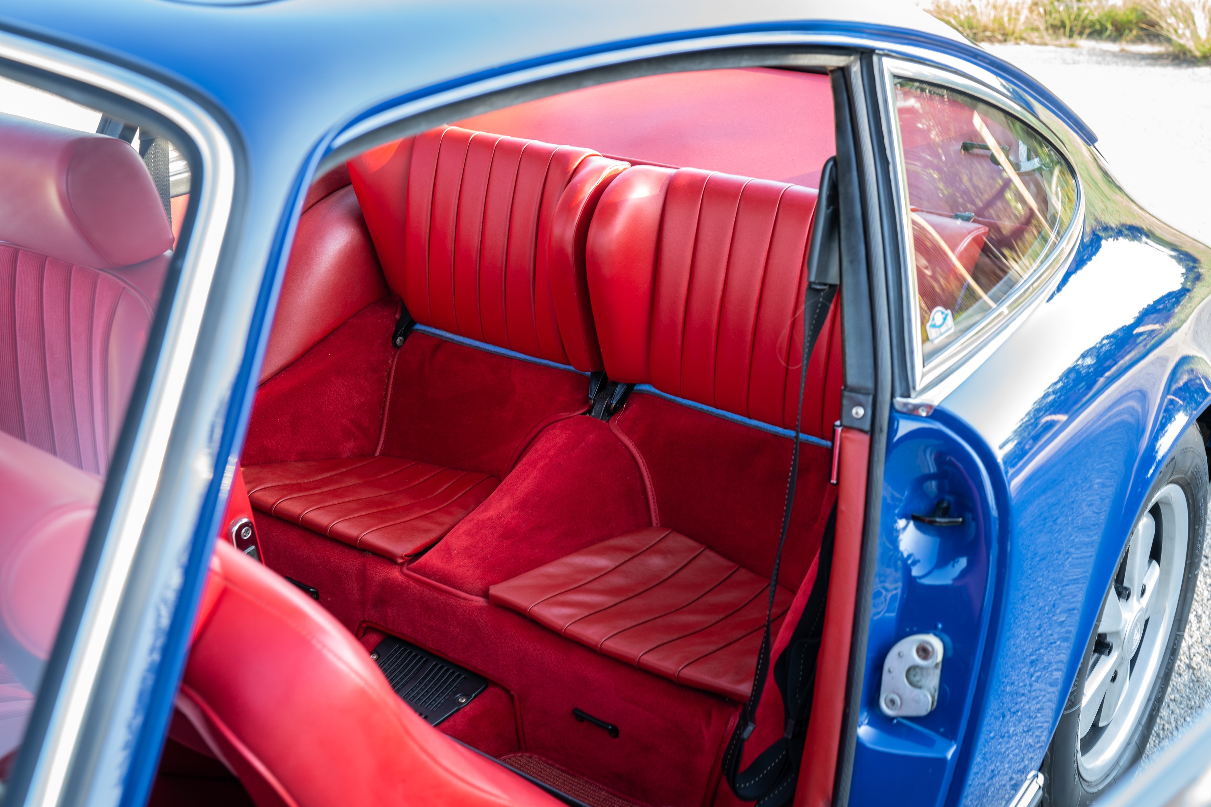 1969 Porsche 911S in Ossi Blue over Red leatherette in Austin, TX.