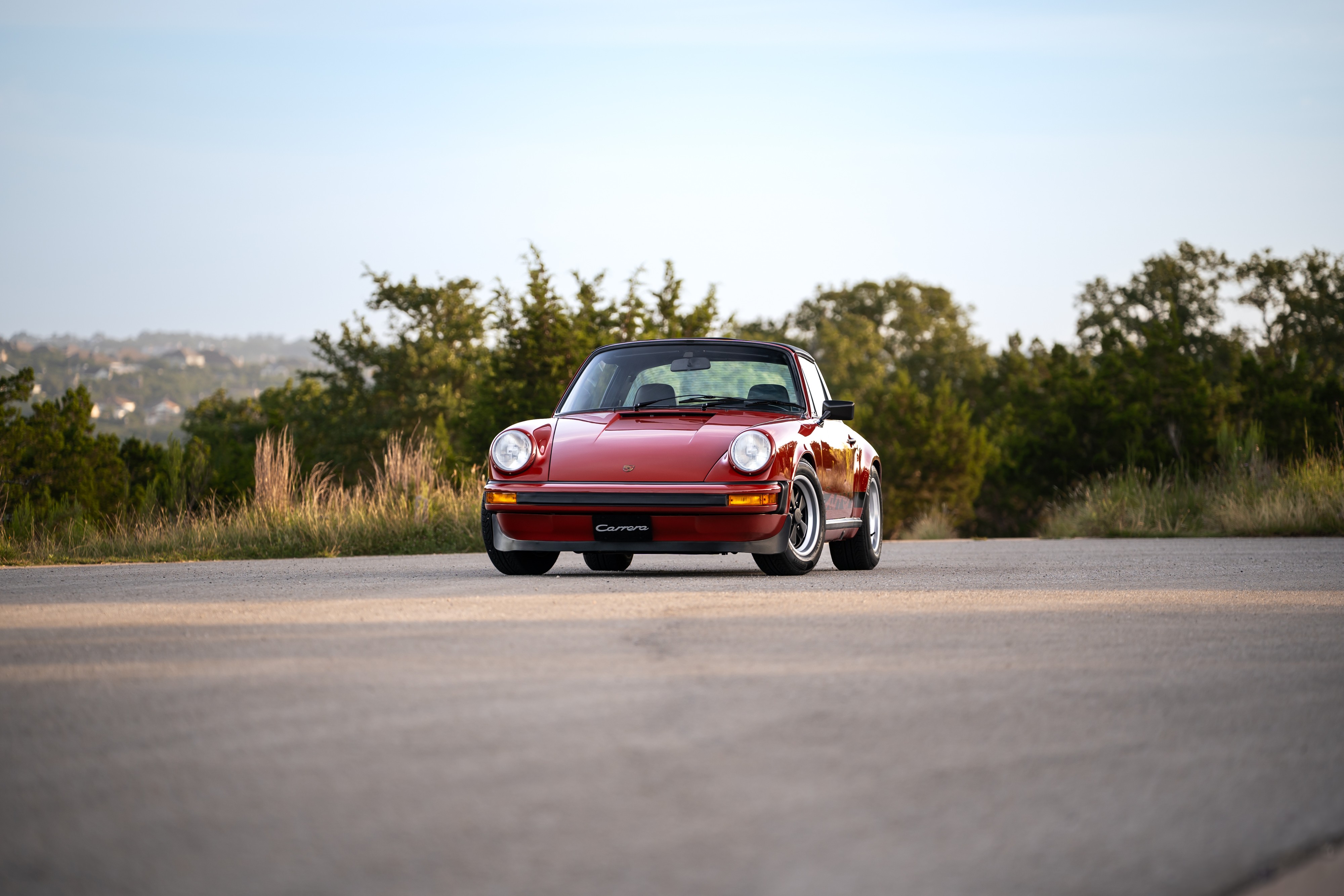 1974 Porsche 911 Carrera Targa in Peru Red over Black.