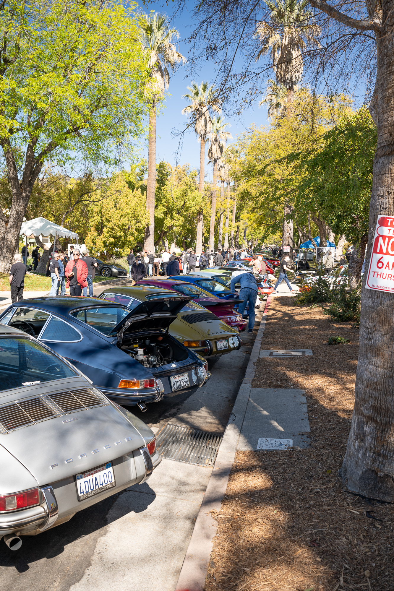 Line of cars along the street outside Sierra Madre