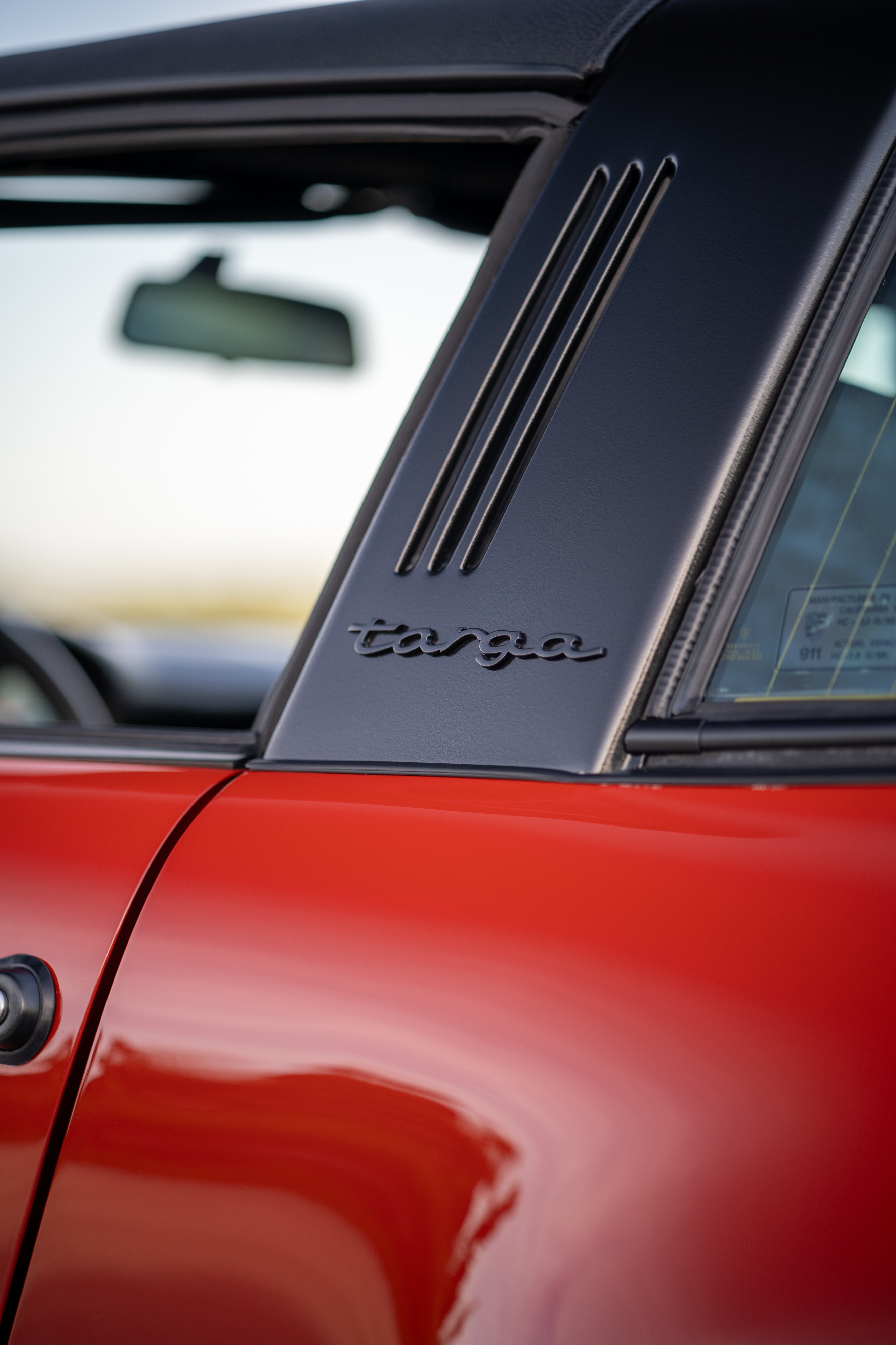 1974 Porsche 911 Carrera Targa in Peru Red over Black.