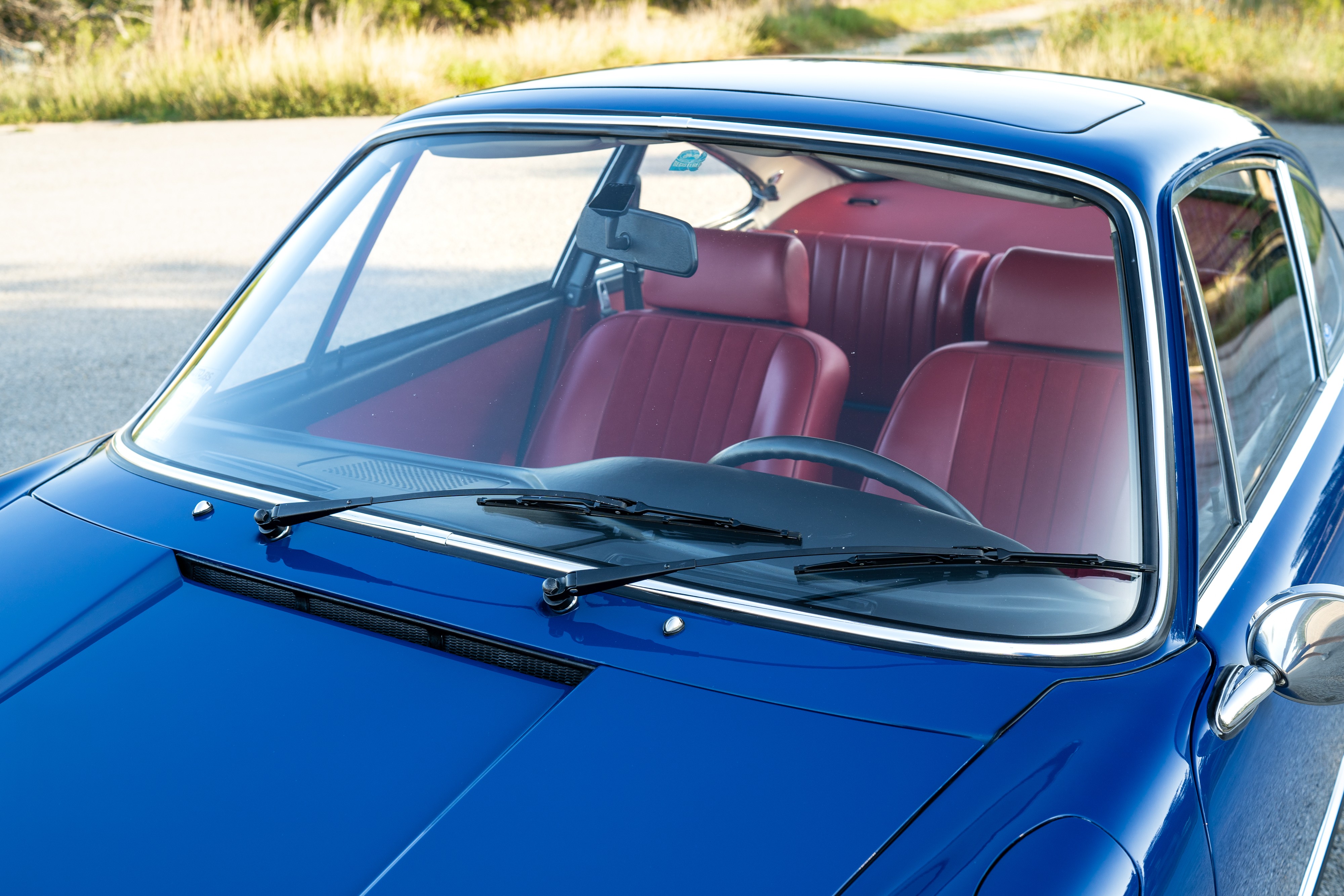 1969 Porsche 911S in Ossi Blue over Red leatherette in Austin, TX.