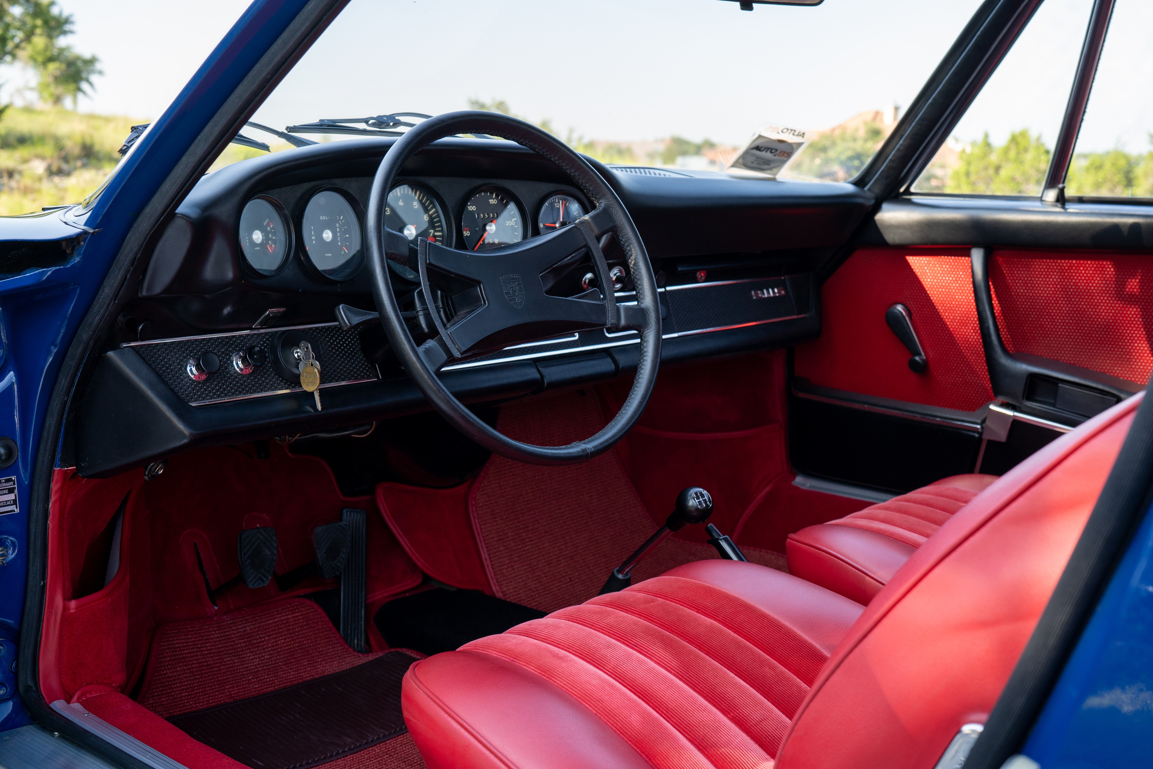 1969 Porsche 911S in Ossi Blue over Red leatherette in Austin, TX.