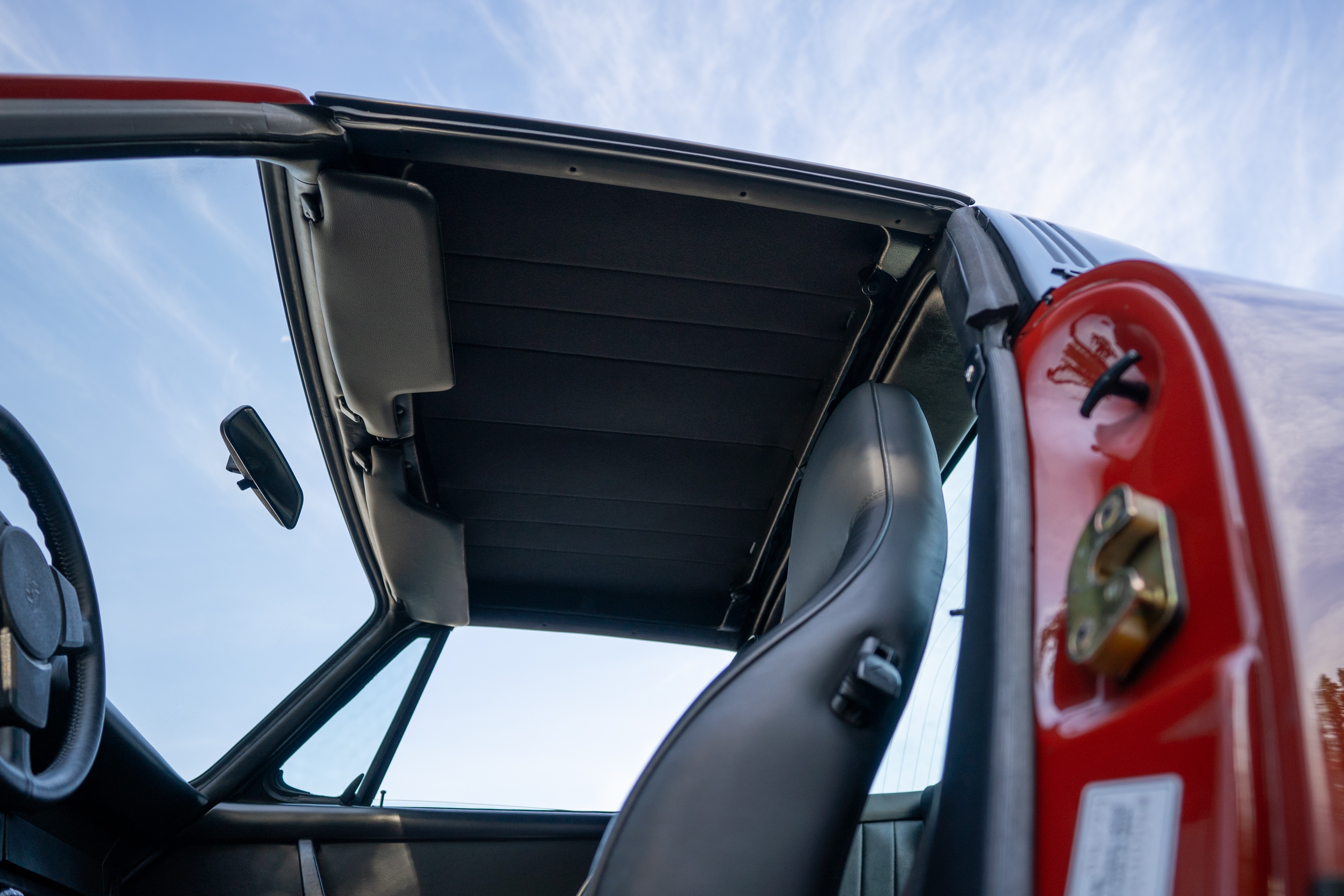 Headliner on a 1974 Porsche 911 Carrera Targa in Peru Red over Black.