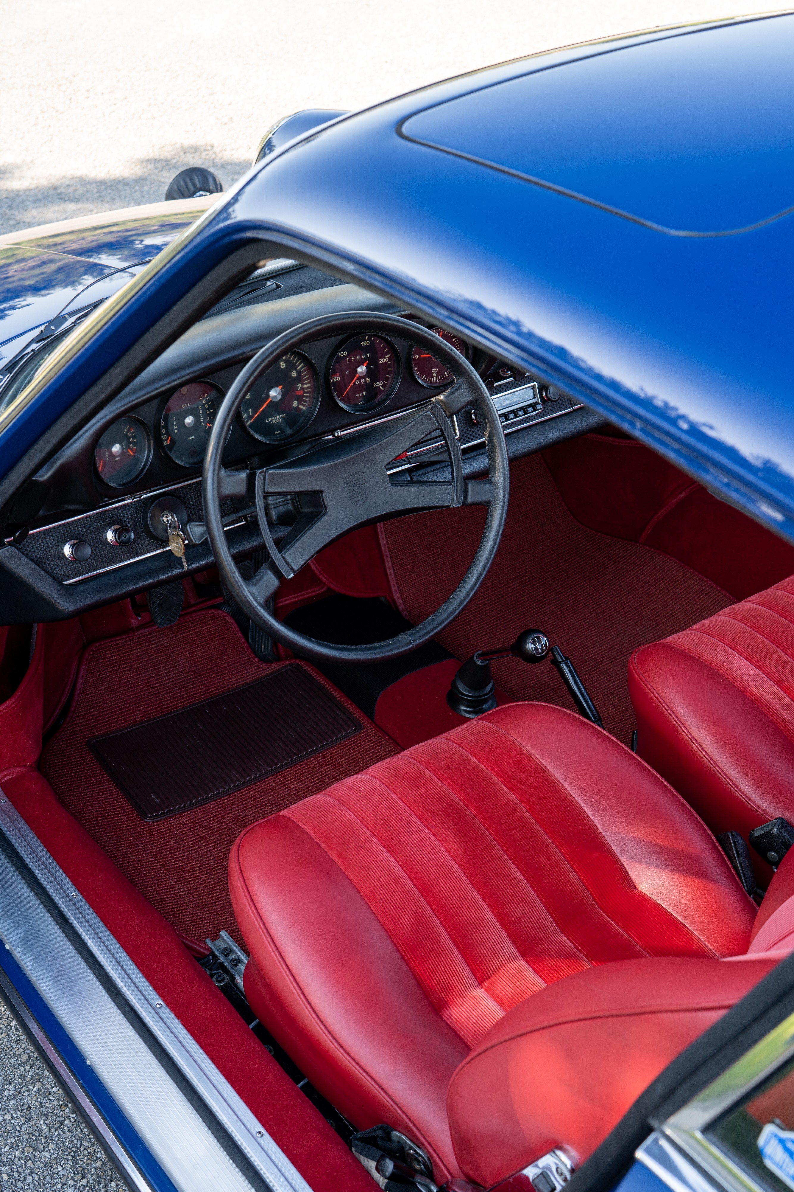 1969 Porsche 911S in Ossi Blue over Red leatherette in Austin, TX.