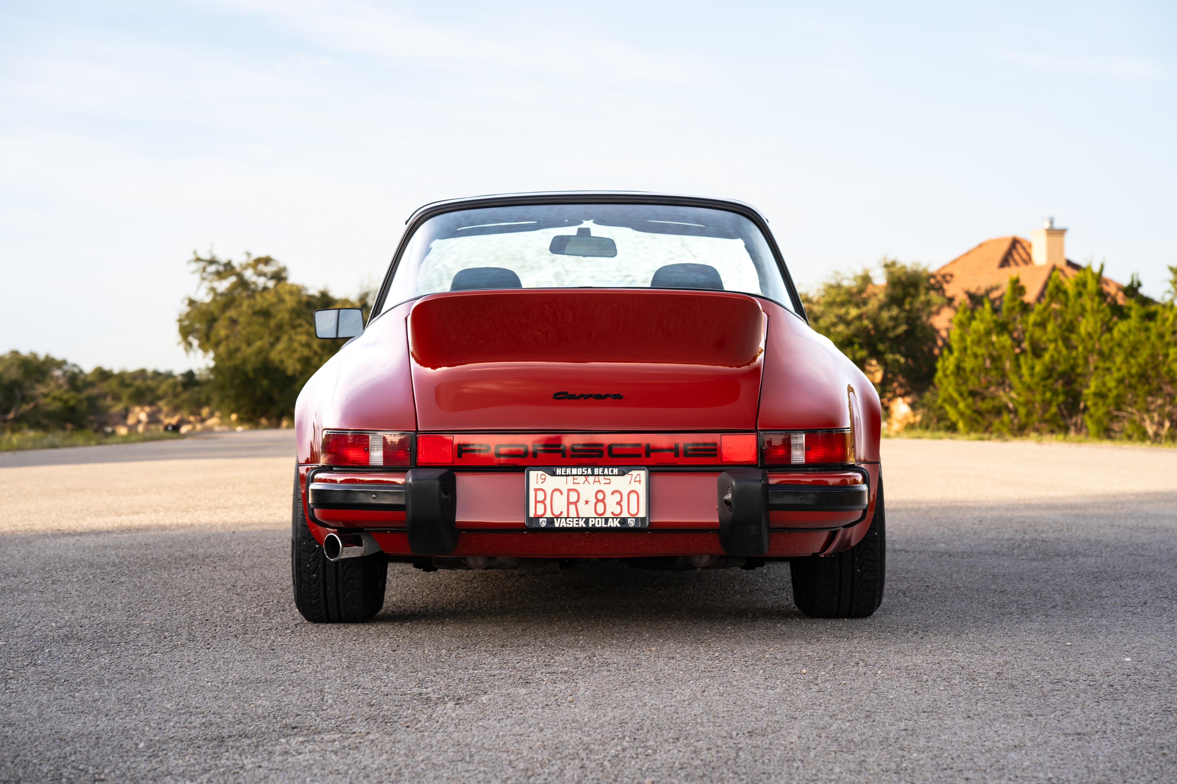 1974 Porsche 911 Carrera Targa in Peru Red over Black.