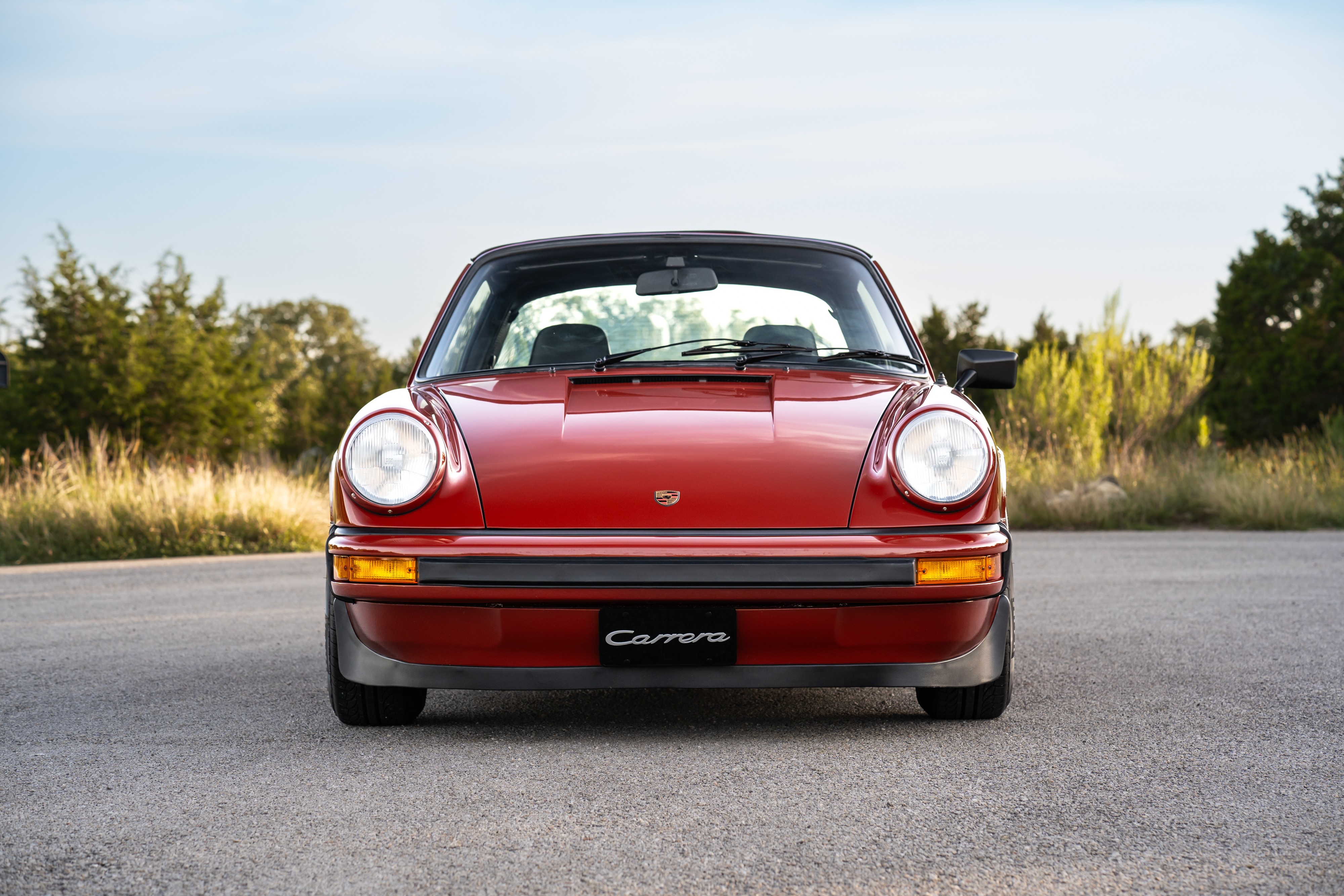 1974 Porsche 911 Carrera Targa in Peru Red over Black.