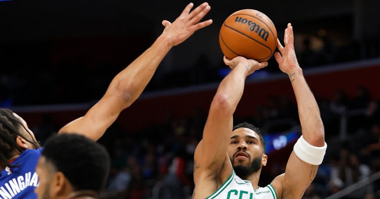 Jayson Tatum shooting a contested jumper.