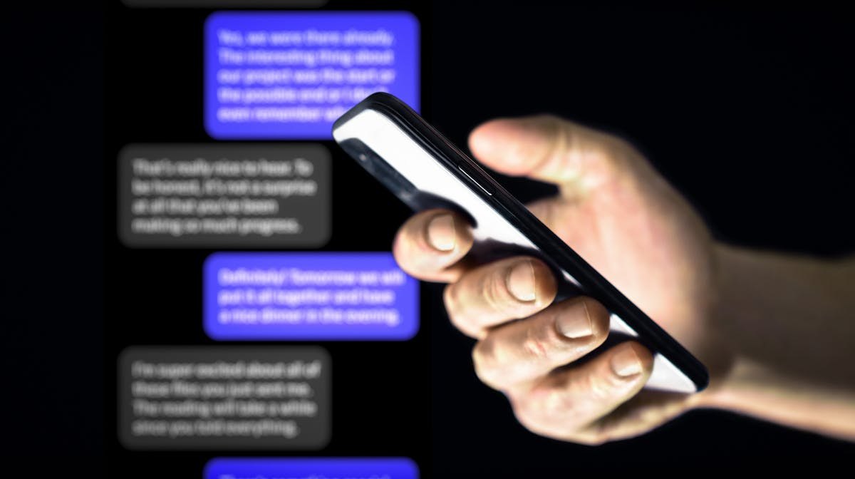 Smartphone showing suspicious text messages, illustrating romance scam red flags you should never ignore