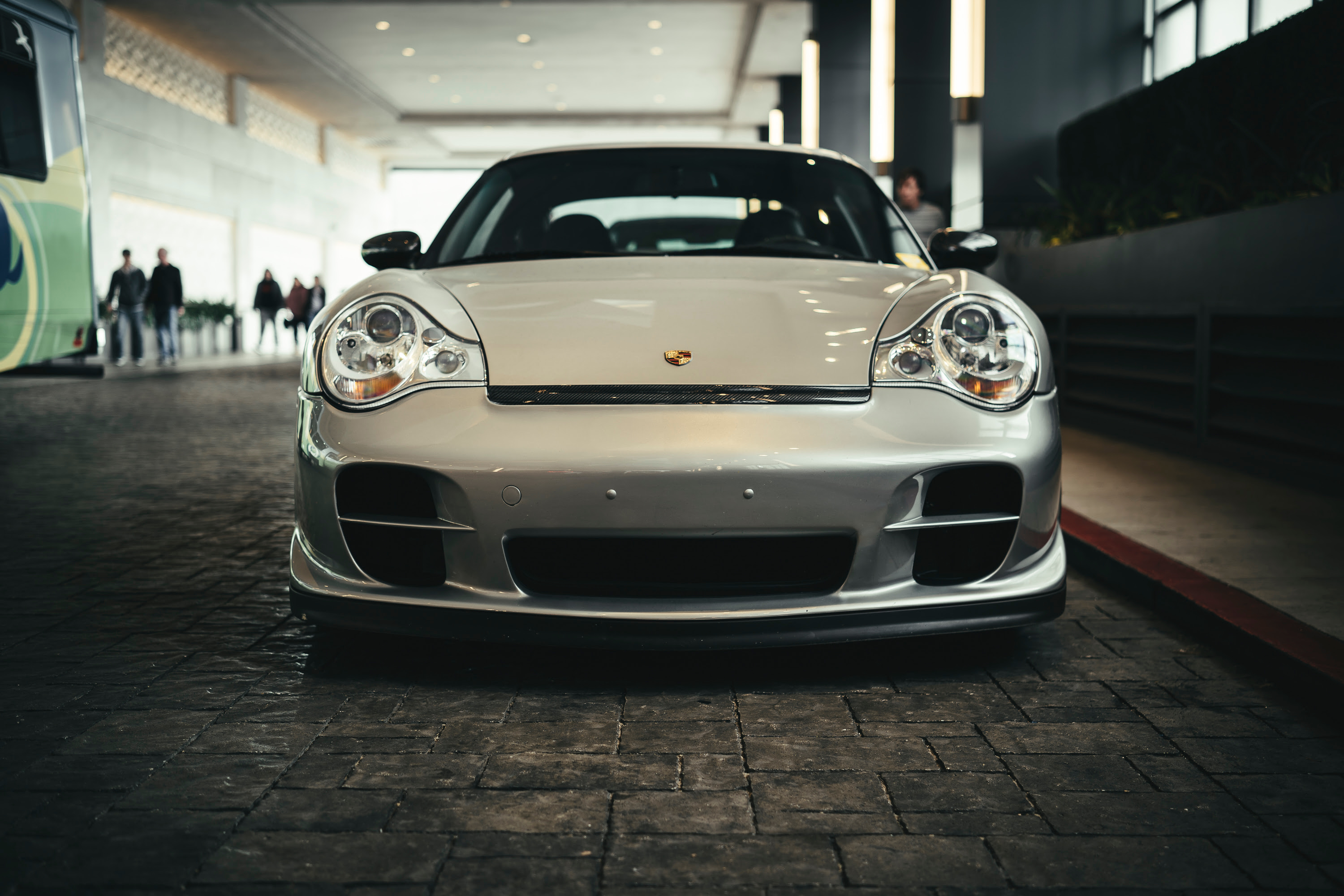 A silver Porsche 996 GT2 outide an LA hotel.