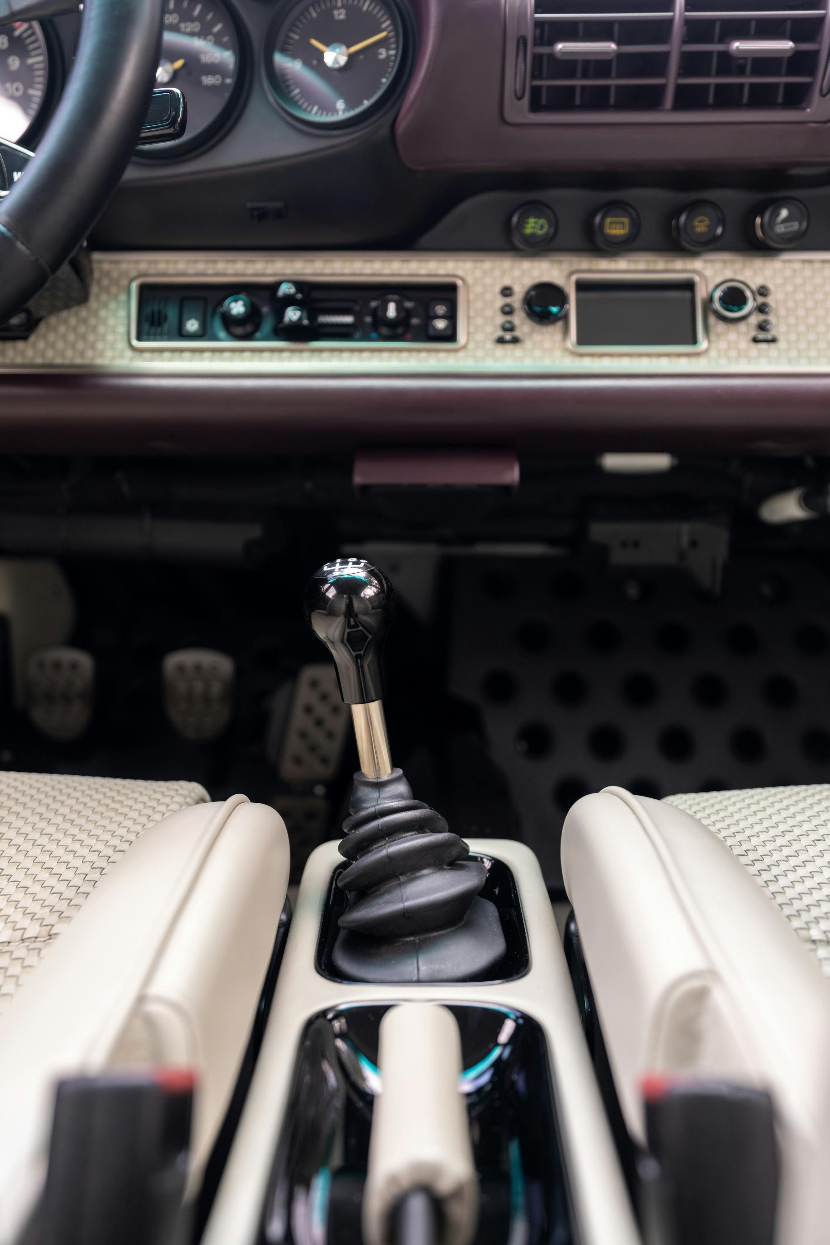 1990 Singer Porsche 911 Carrera 2 "Austin" commission in Aubergine Metallic shot in Austin, TX for a Bring a Trailer auction.