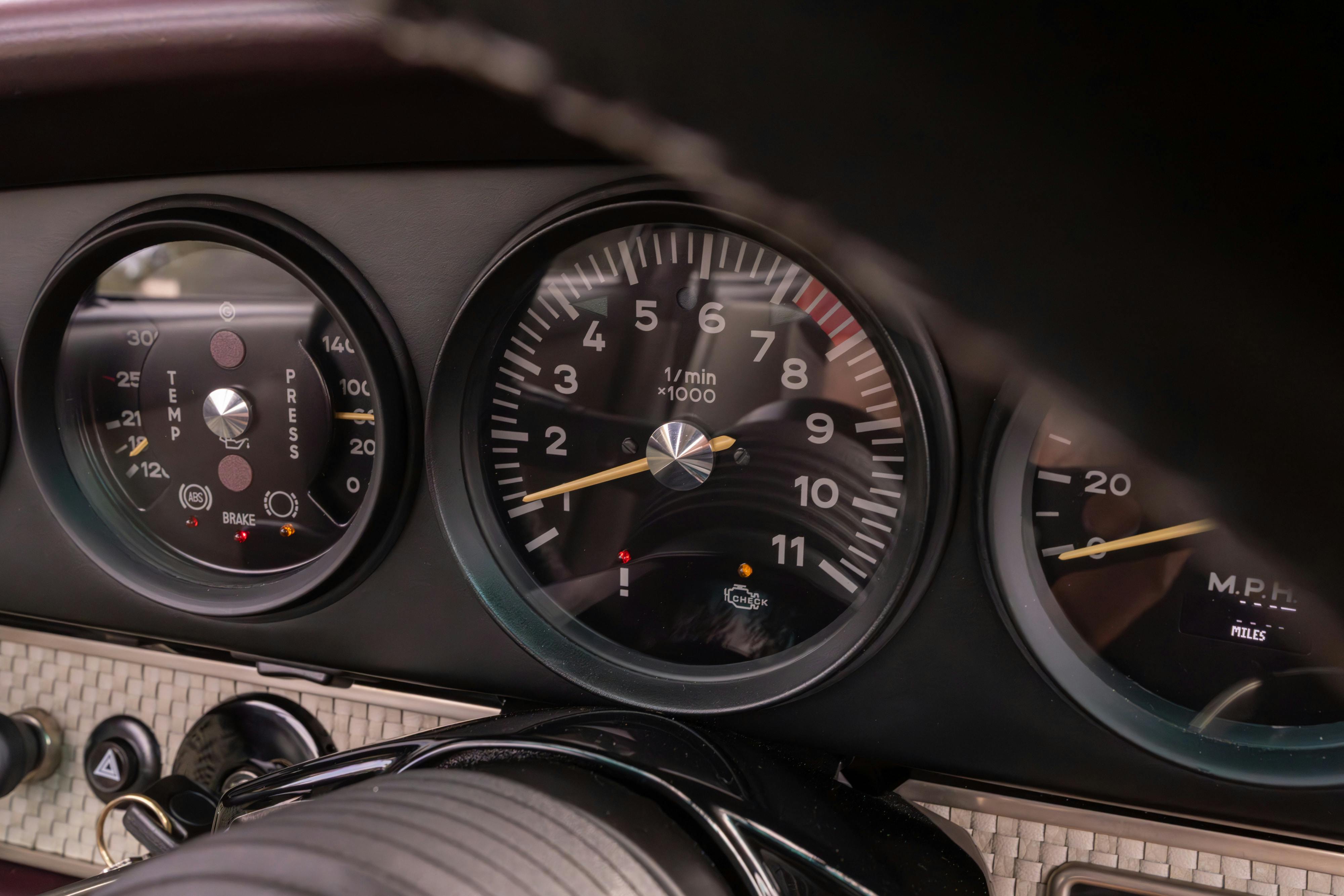 1990 Singer Porsche 911 Carrera 2 "Austin" commission in Aubergine Metallic shot in Austin, TX for a Bring a Trailer auction.