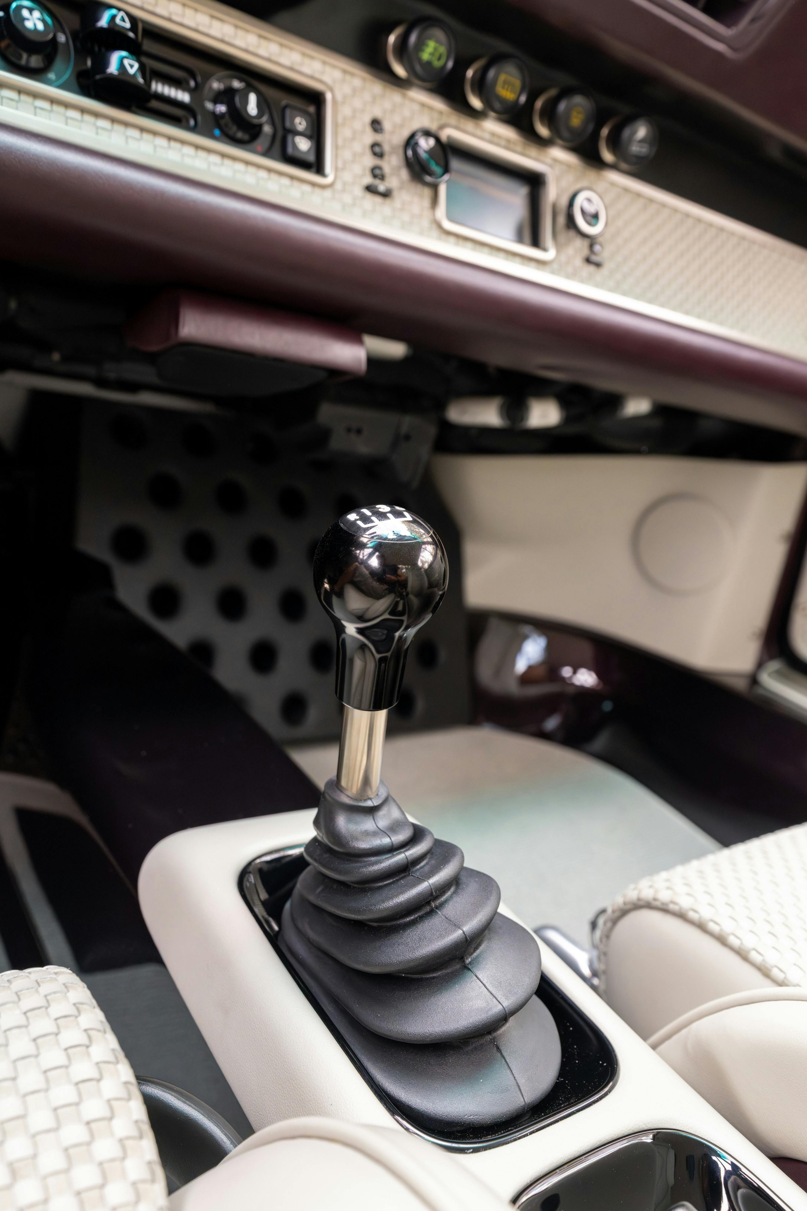 1990 Singer Porsche 911 Carrera 2 "Austin" commission in Aubergine Metallic shot in Austin, TX for a Bring a Trailer auction.