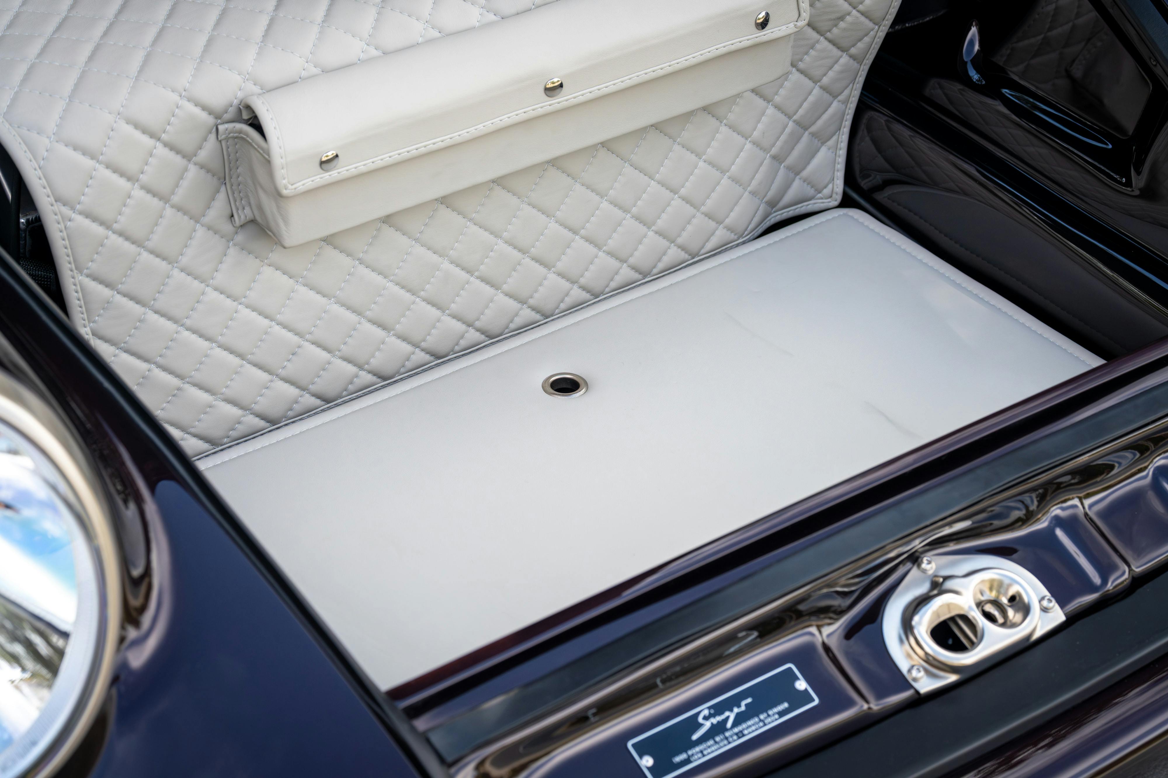 1990 Singer Porsche 911 Carrera 2 "Austin" commission in Aubergine Metallic shot in Austin, TX for a Bring a Trailer auction.