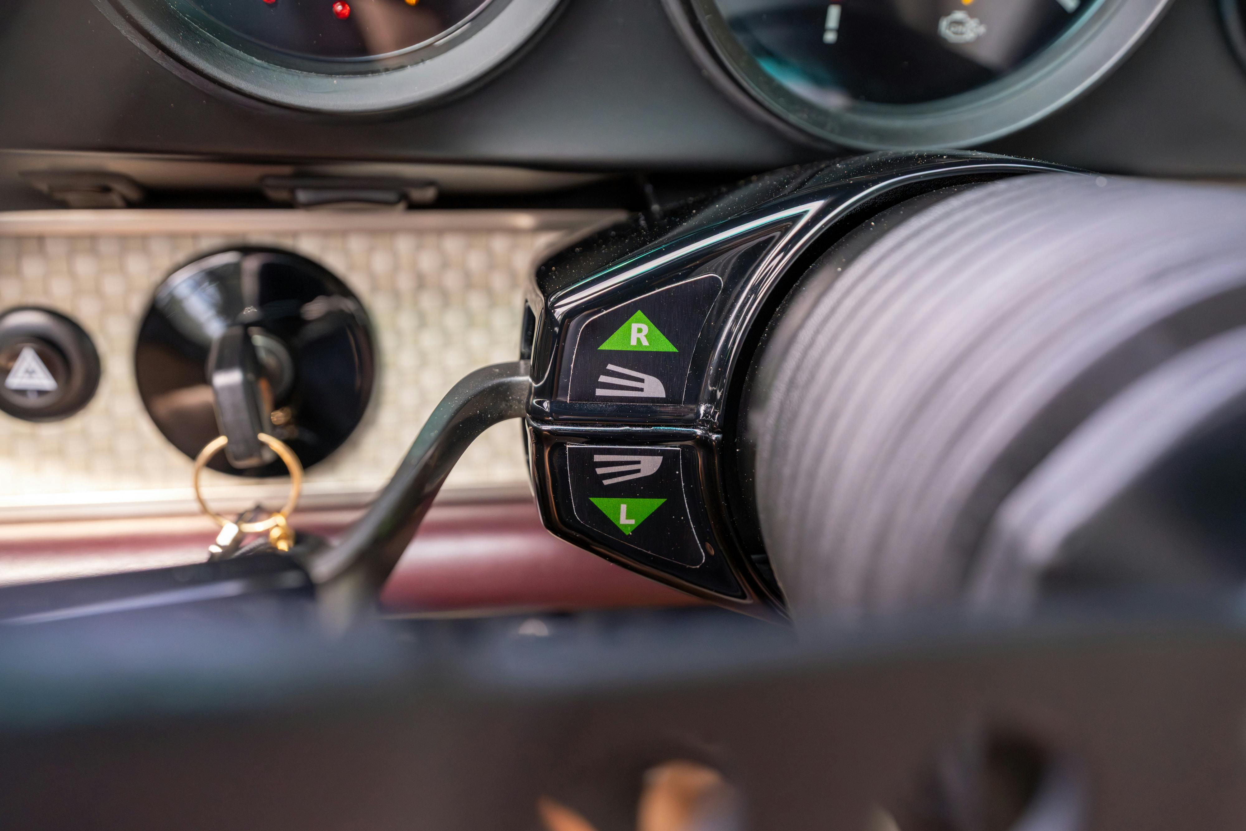 1990 Singer Porsche 911 Carrera 2 "Austin" commission in Aubergine Metallic shot in Austin, TX for a Bring a Trailer auction.