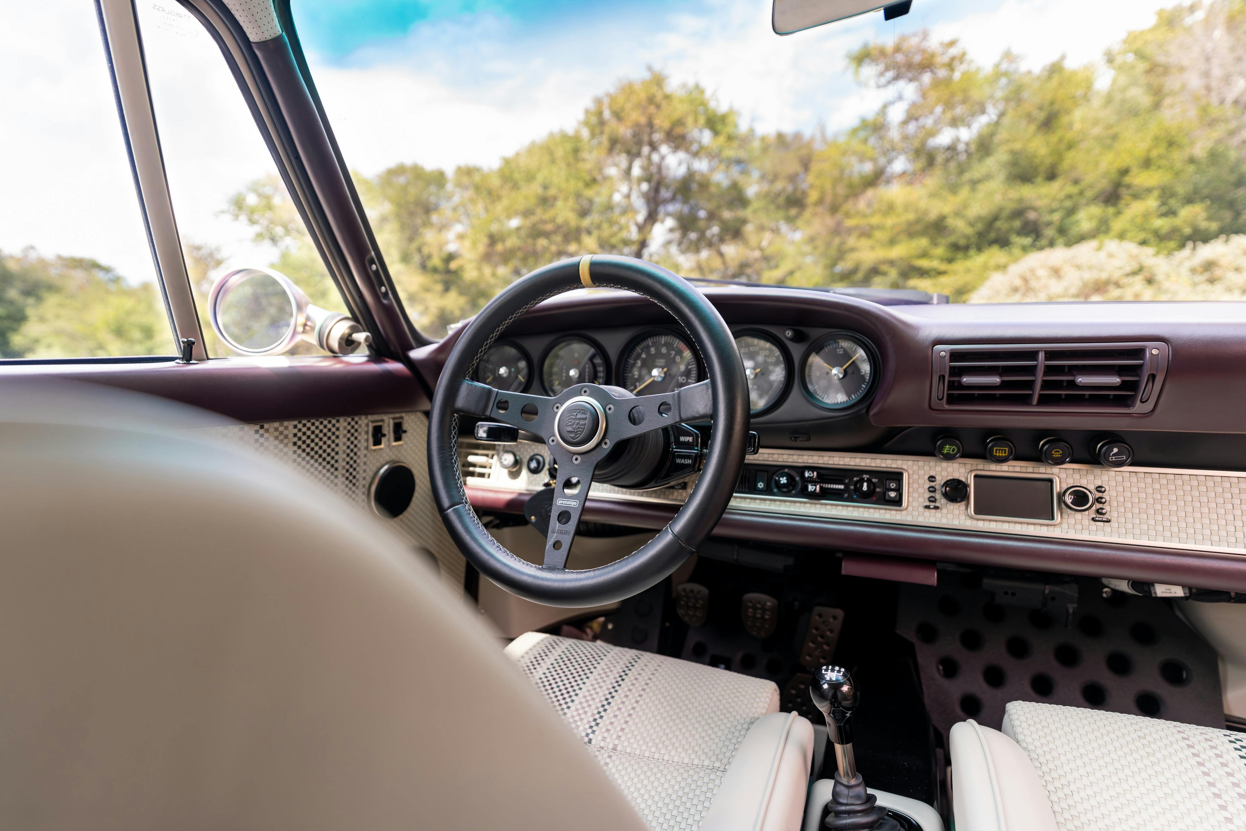 1990 Singer Porsche 911 Carrera 2 "Austin" commission in Aubergine Metallic shot in Austin, TX for a Bring a Trailer auction.