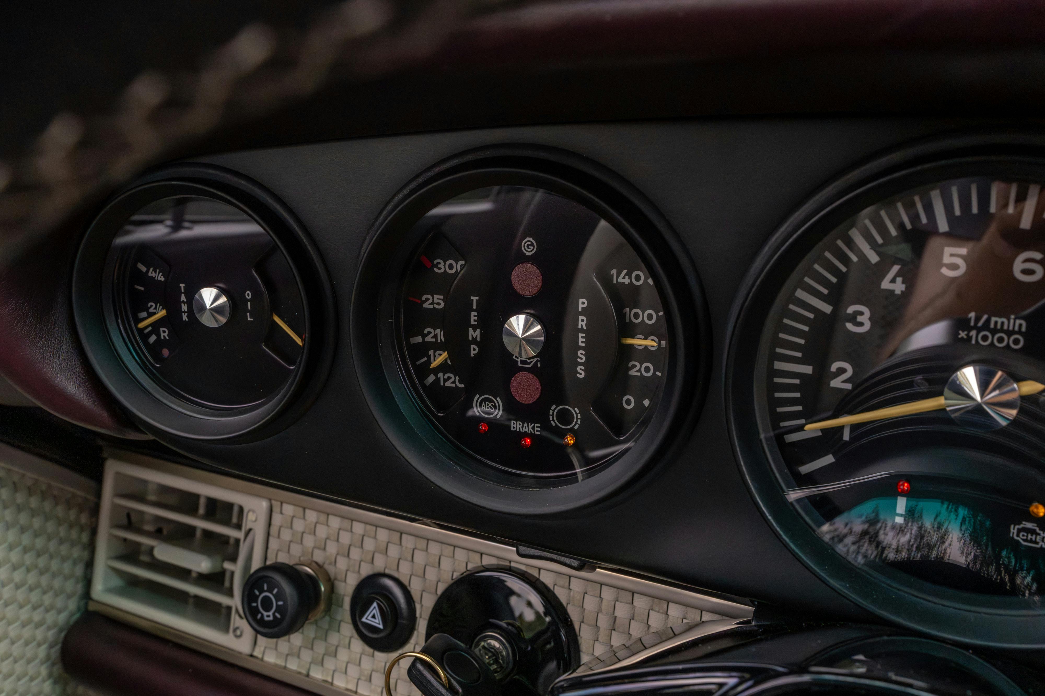 1990 Singer Porsche 911 Carrera 2 "Austin" commission in Aubergine Metallic shot in Austin, TX for a Bring a Trailer auction.