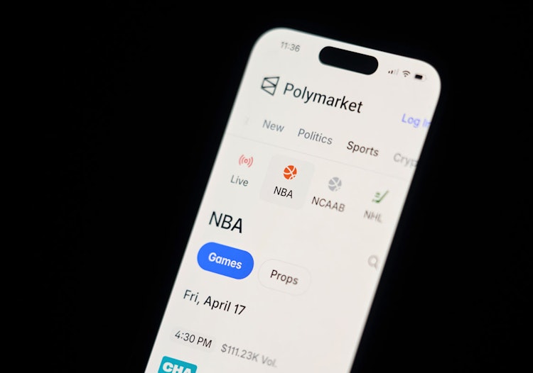 Polymarket Parlays: Polymarket sports interface showing markets and multi-leg sports contract features on a mobile phone.
