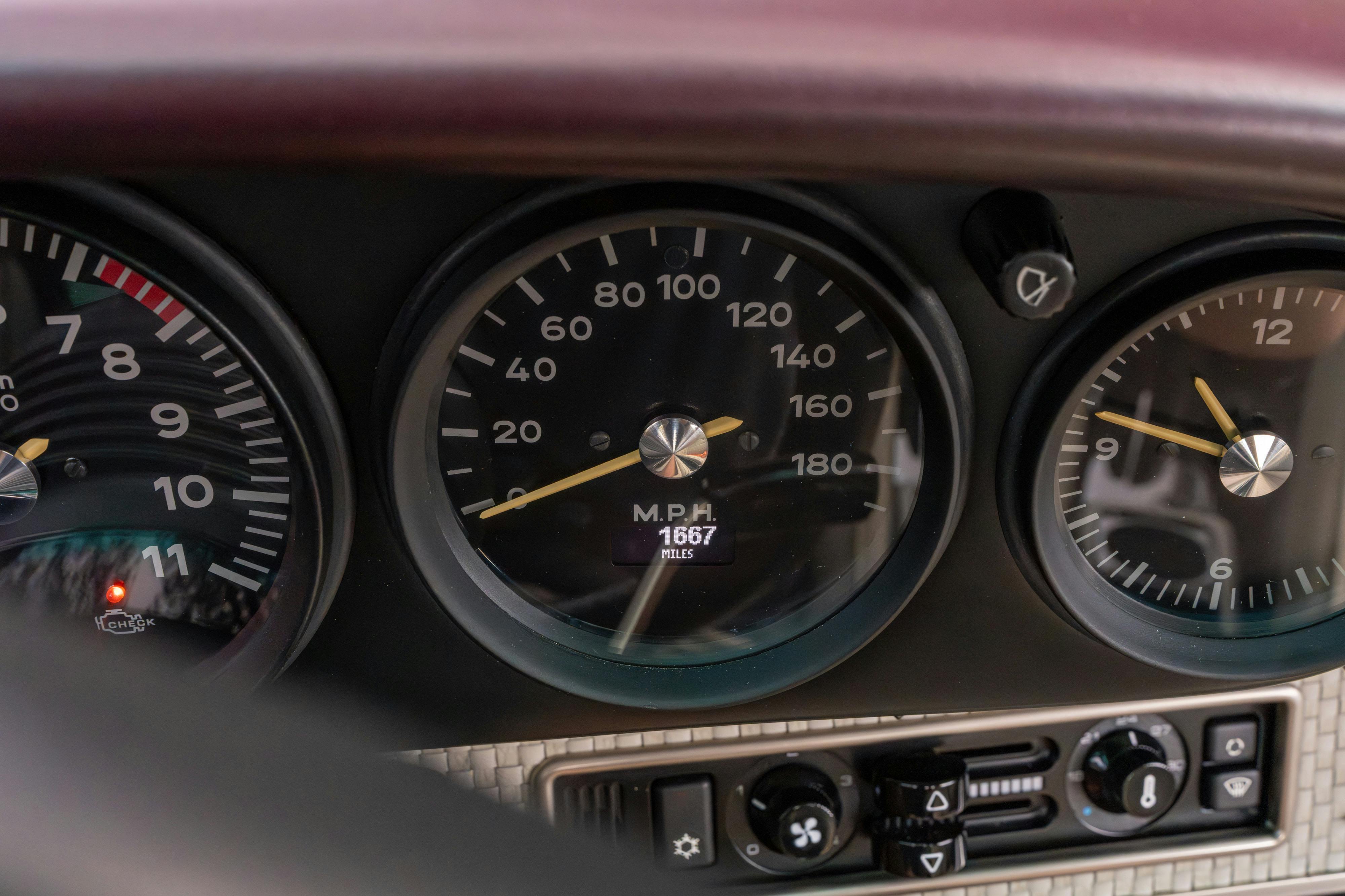1990 Singer Porsche 911 Carrera 2 "Austin" commission in Aubergine Metallic shot in Austin, TX for a Bring a Trailer auction.