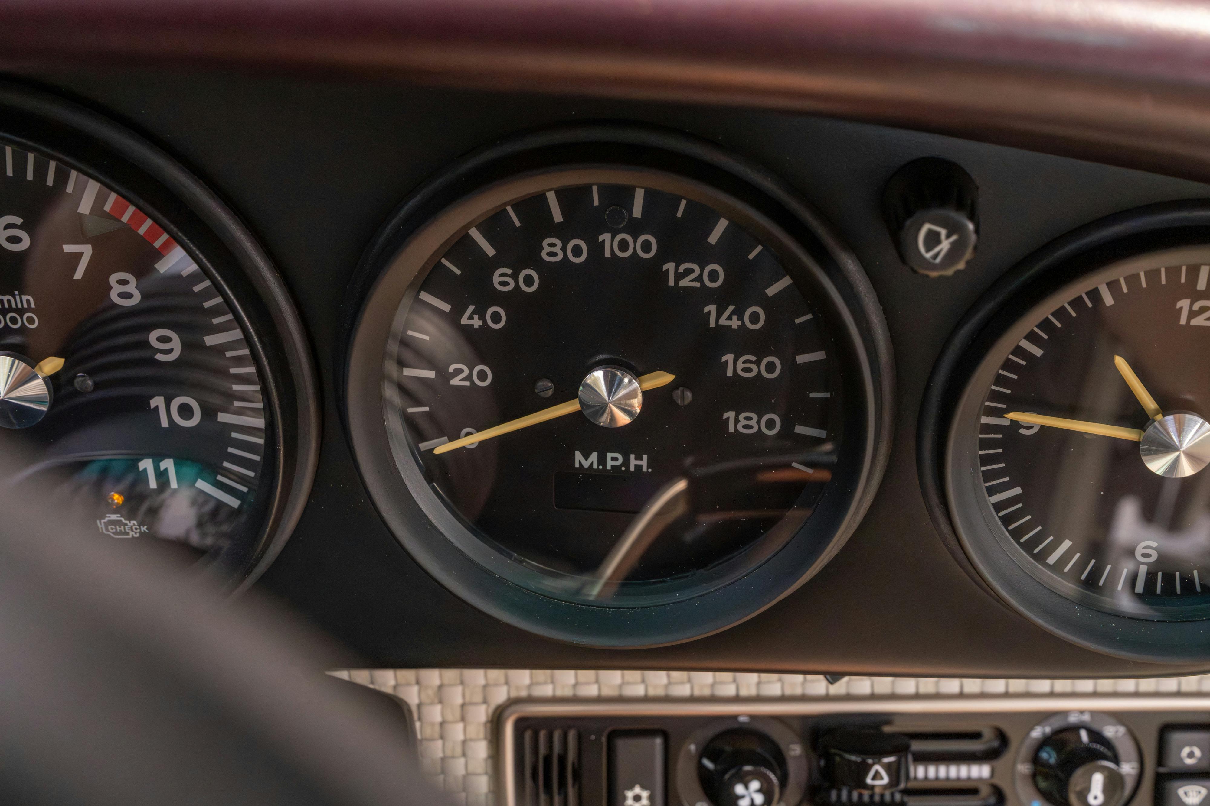 1990 Singer Porsche 911 Carrera 2 "Austin" commission in Aubergine Metallic shot in Austin, TX for a Bring a Trailer auction.