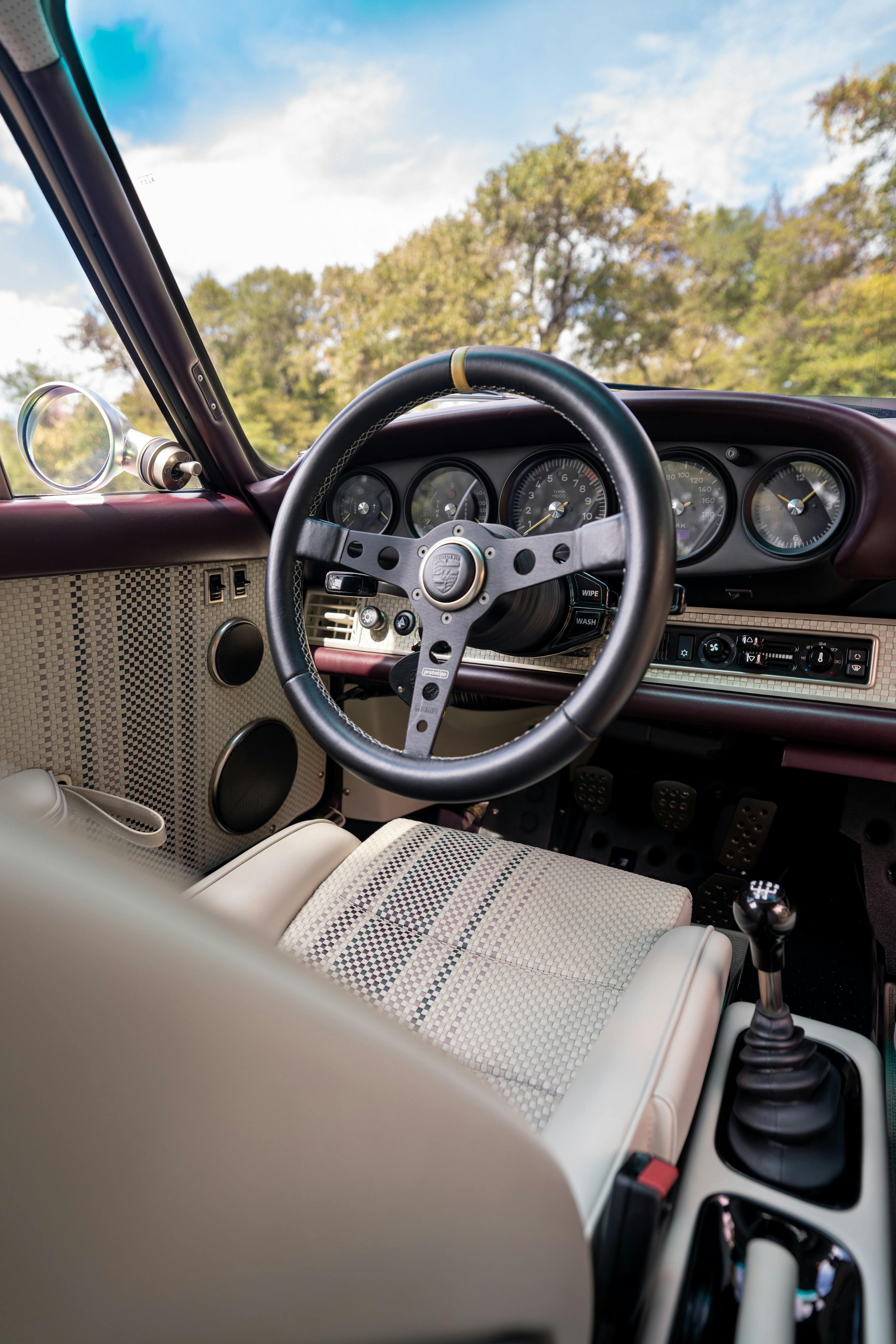 1990 Singer Porsche 911 Carrera 2 "Austin" commission in Aubergine Metallic shot in Austin, TX for a Bring a Trailer auction.