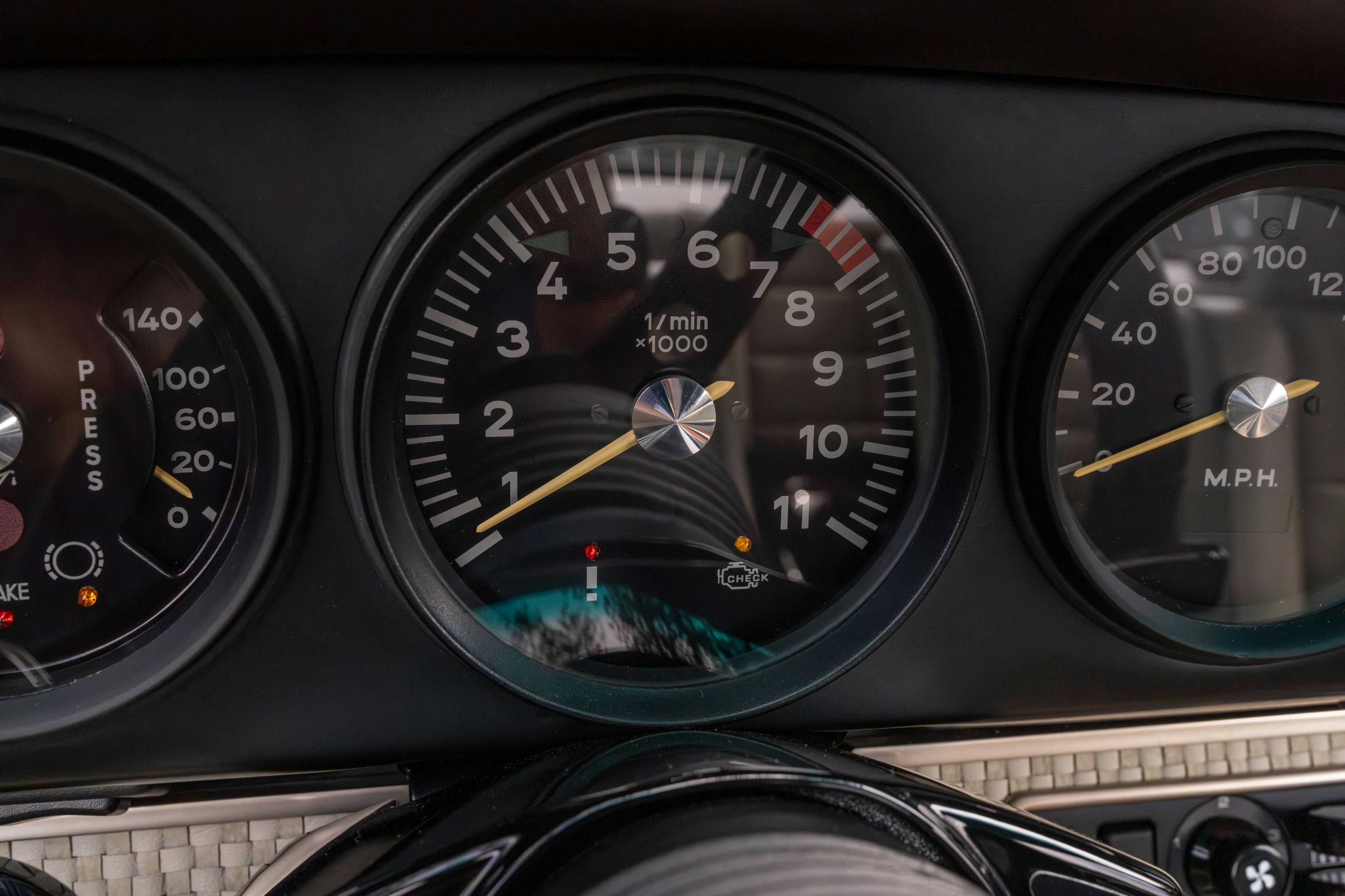 1990 Singer Porsche 911 Carrera 2 "Austin" commission in Aubergine Metallic shot in Austin, TX for a Bring a Trailer auction.