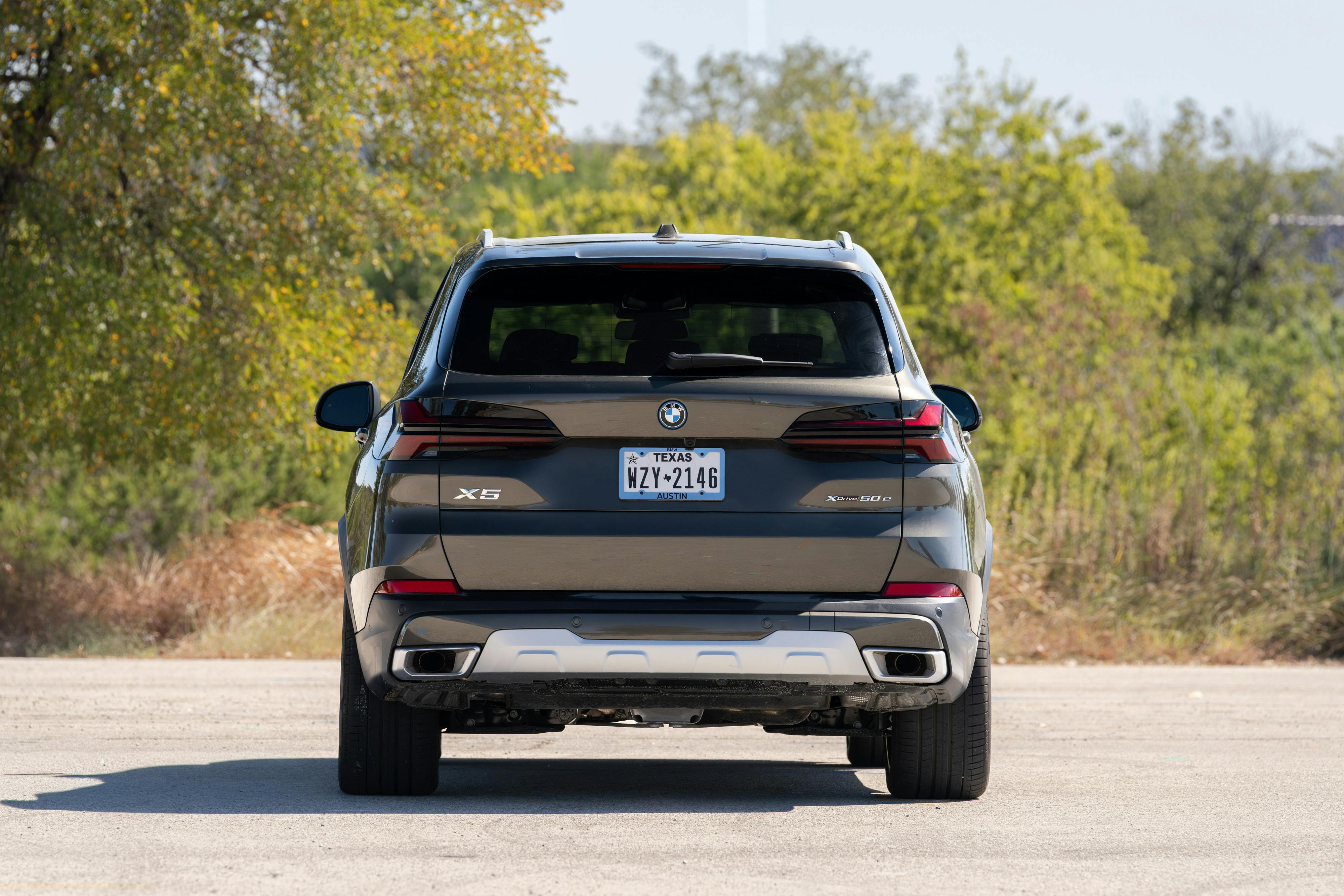 2026 BMW X5 in Manhattan Green Metallic shot in Austin, TX for a Turo rental.