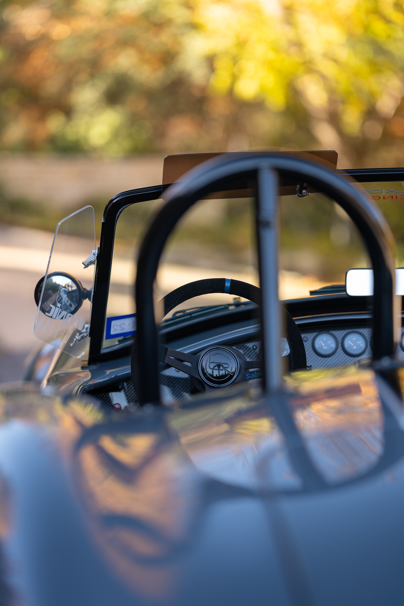 Cobra replica steering wheel behind the rollbar