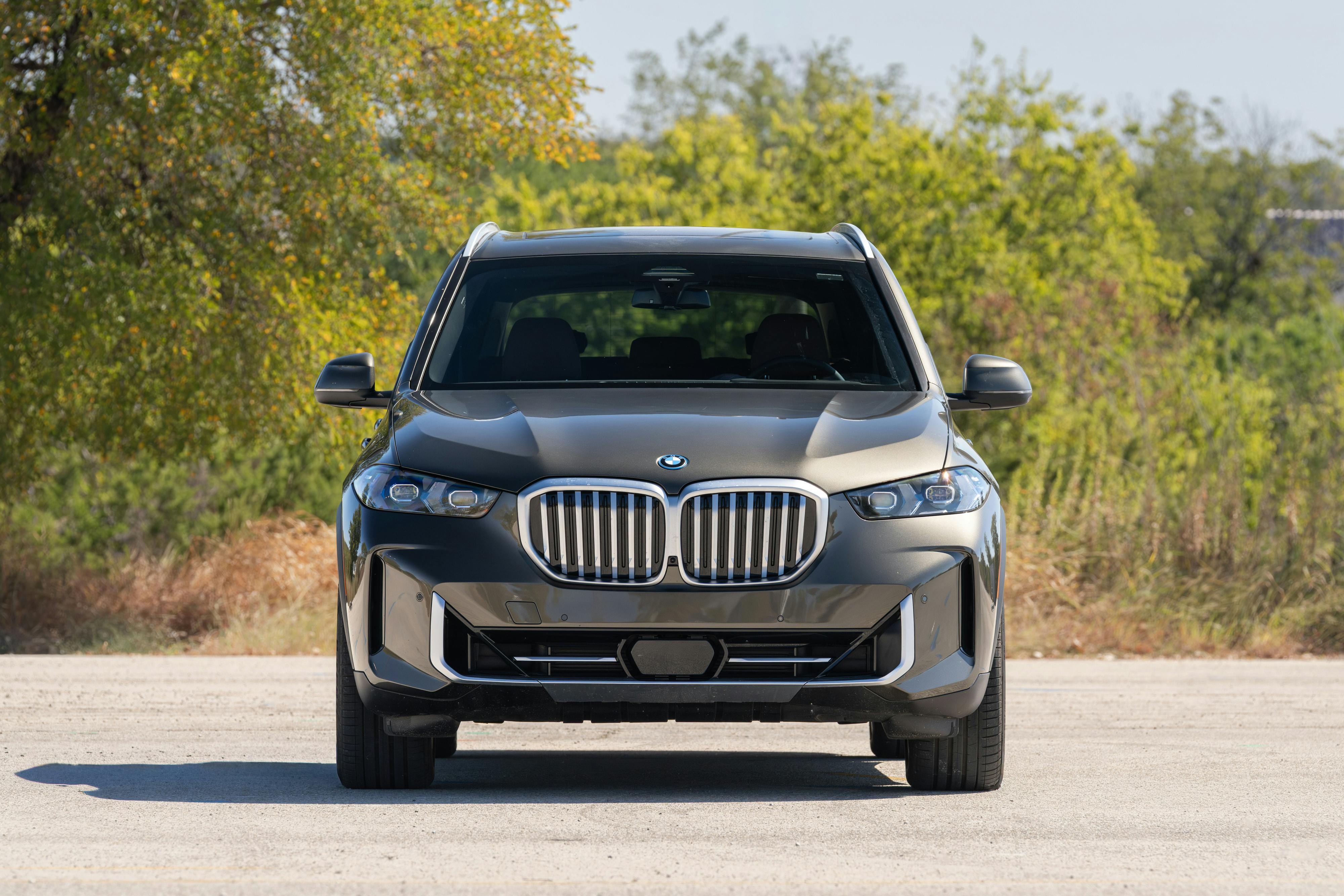 2026 BMW X5 in Manhattan Green Metallic shot in Austin, TX for a Turo rental.