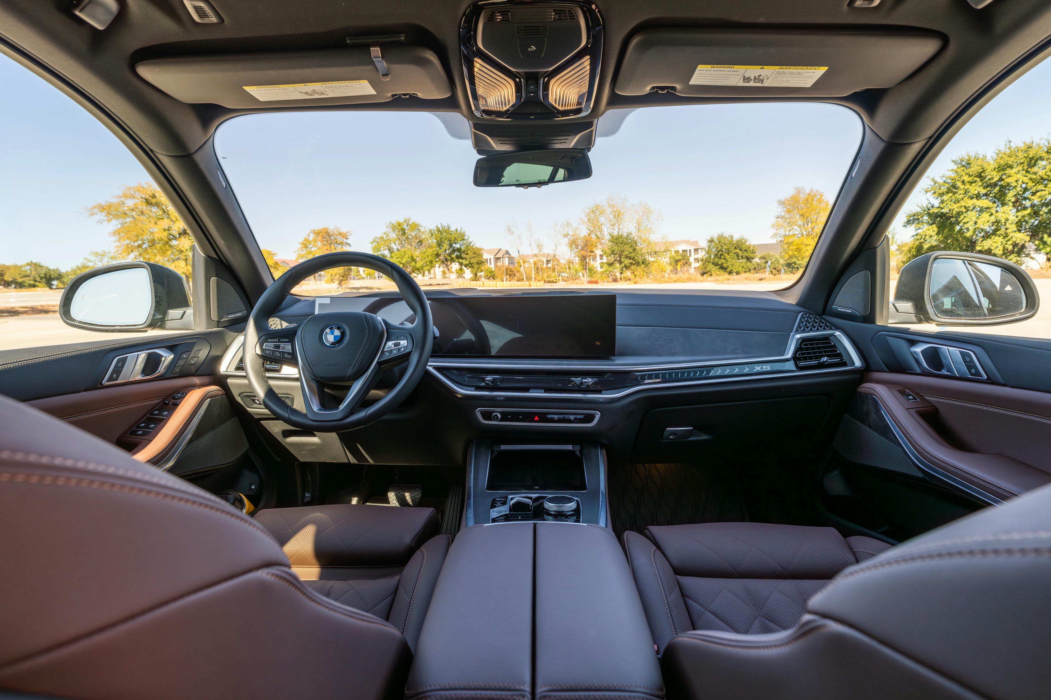 2026 BMW X5 in Manhattan Green Metallic shot in Austin, TX for a Turo rental.