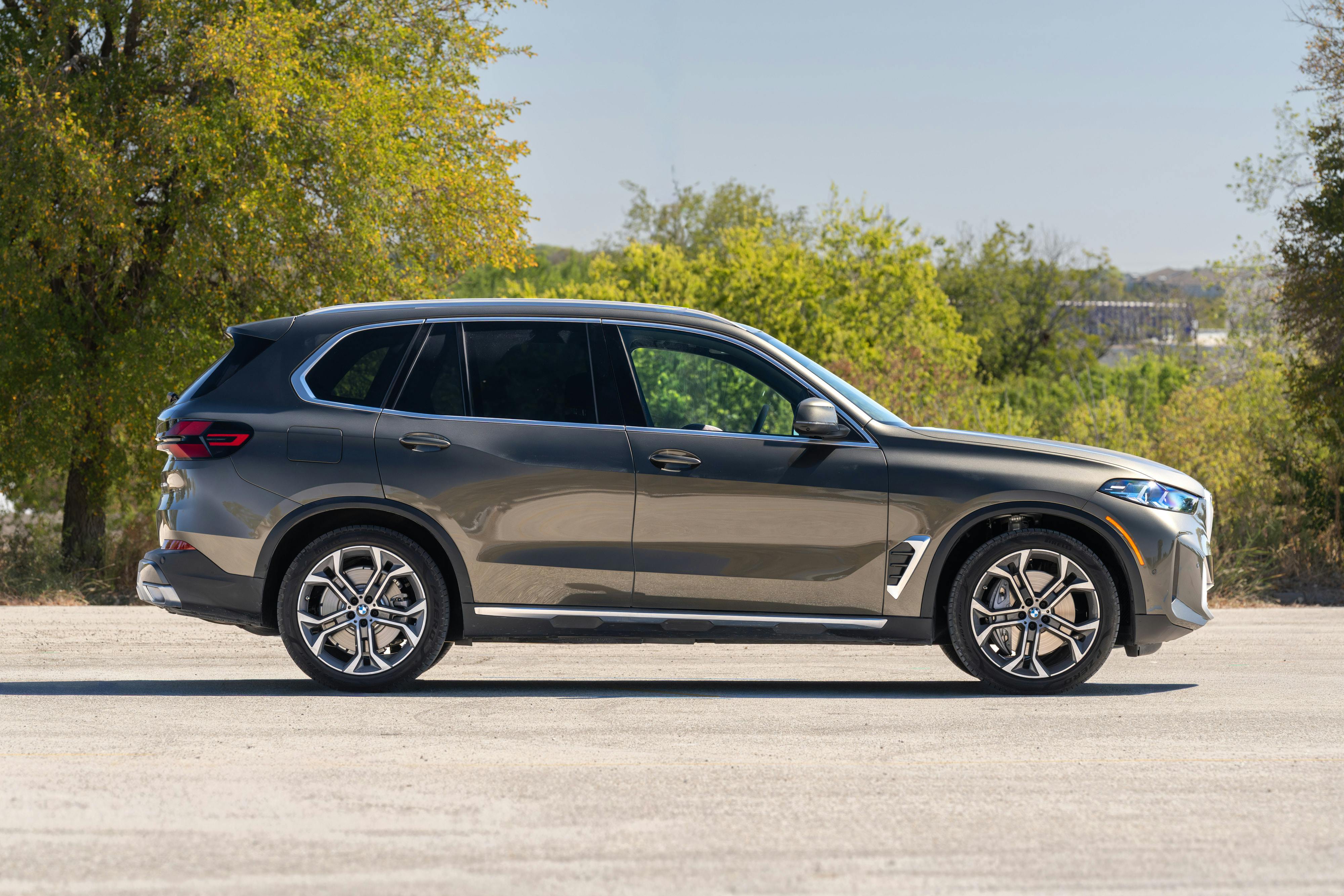 2026 BMW X5 in Manhattan Green Metallic shot in Austin, TX for a Turo rental.