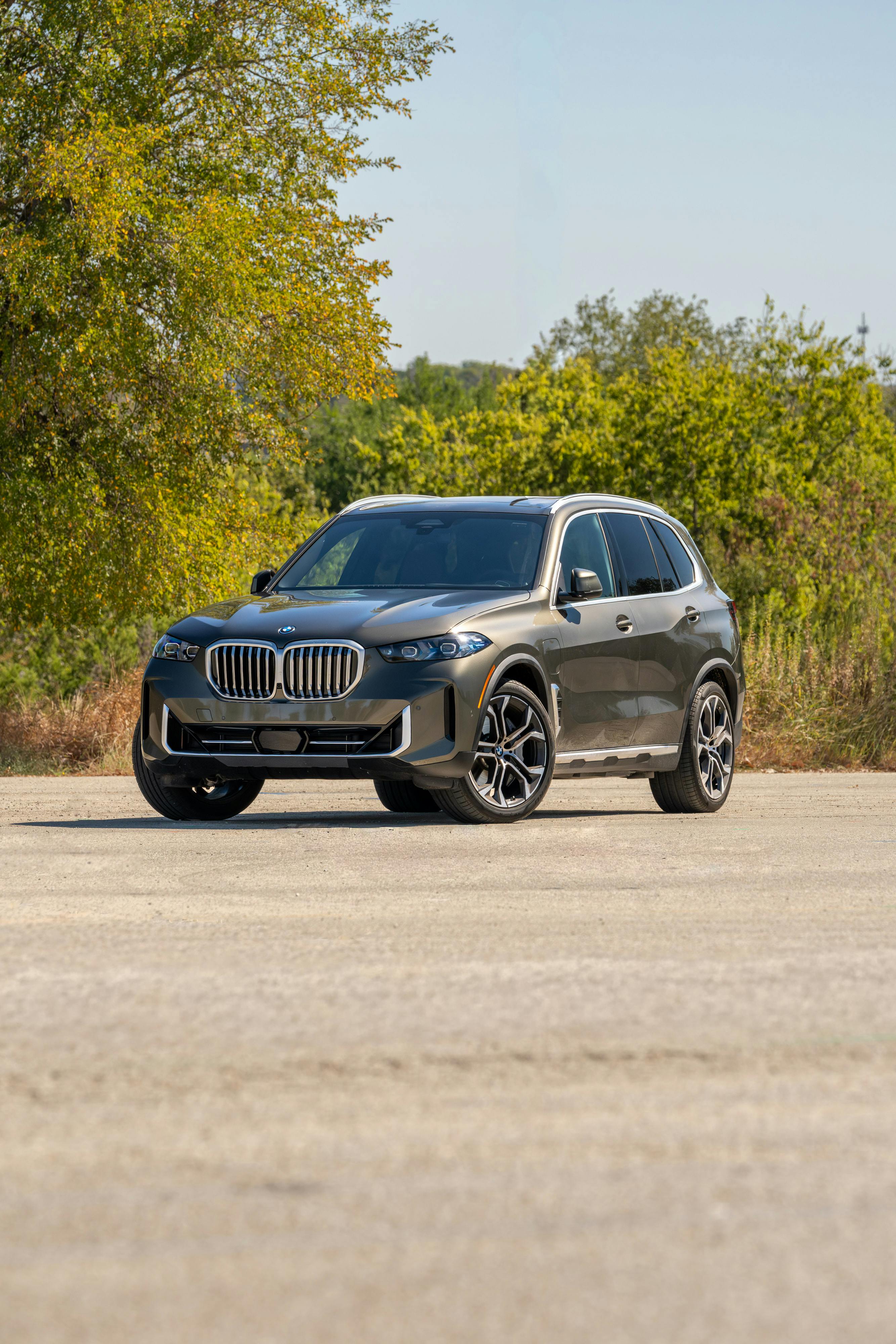 2026 BMW X5 in Manhattan Green Metallic shot in Austin, TX for a Turo rental.