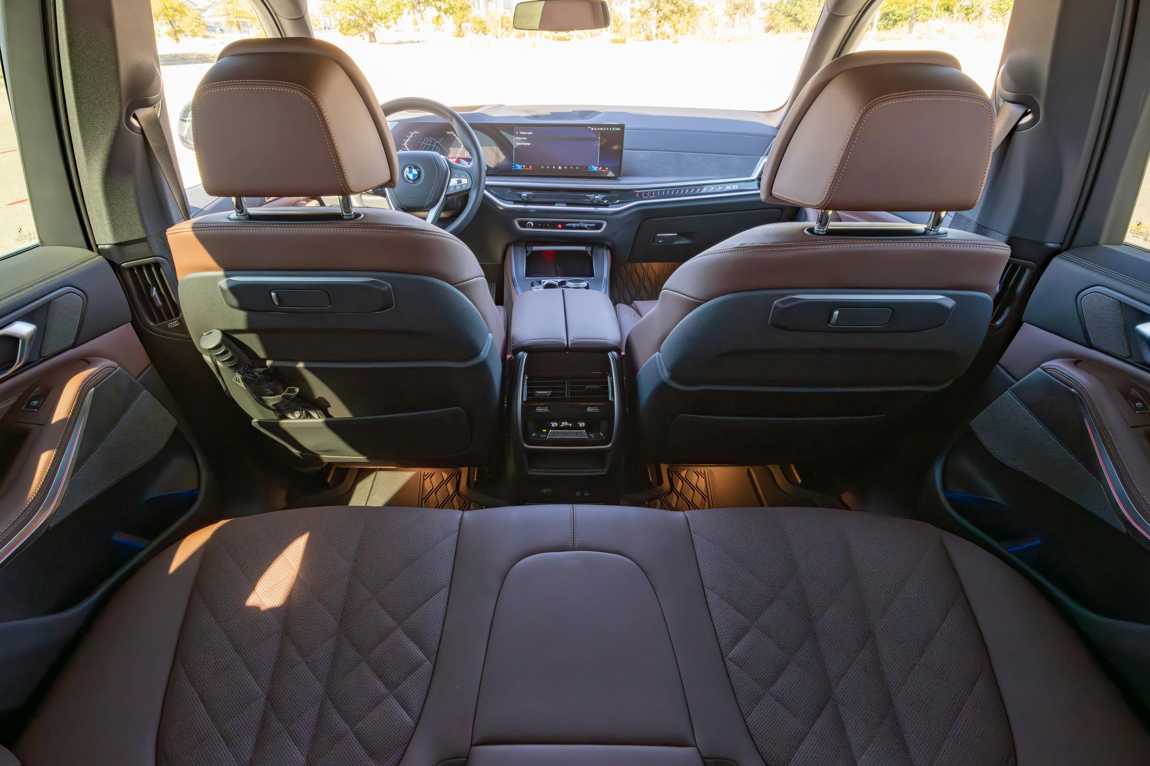 2026 BMW X5 in Manhattan Green Metallic shot in Austin, TX for a Turo rental.