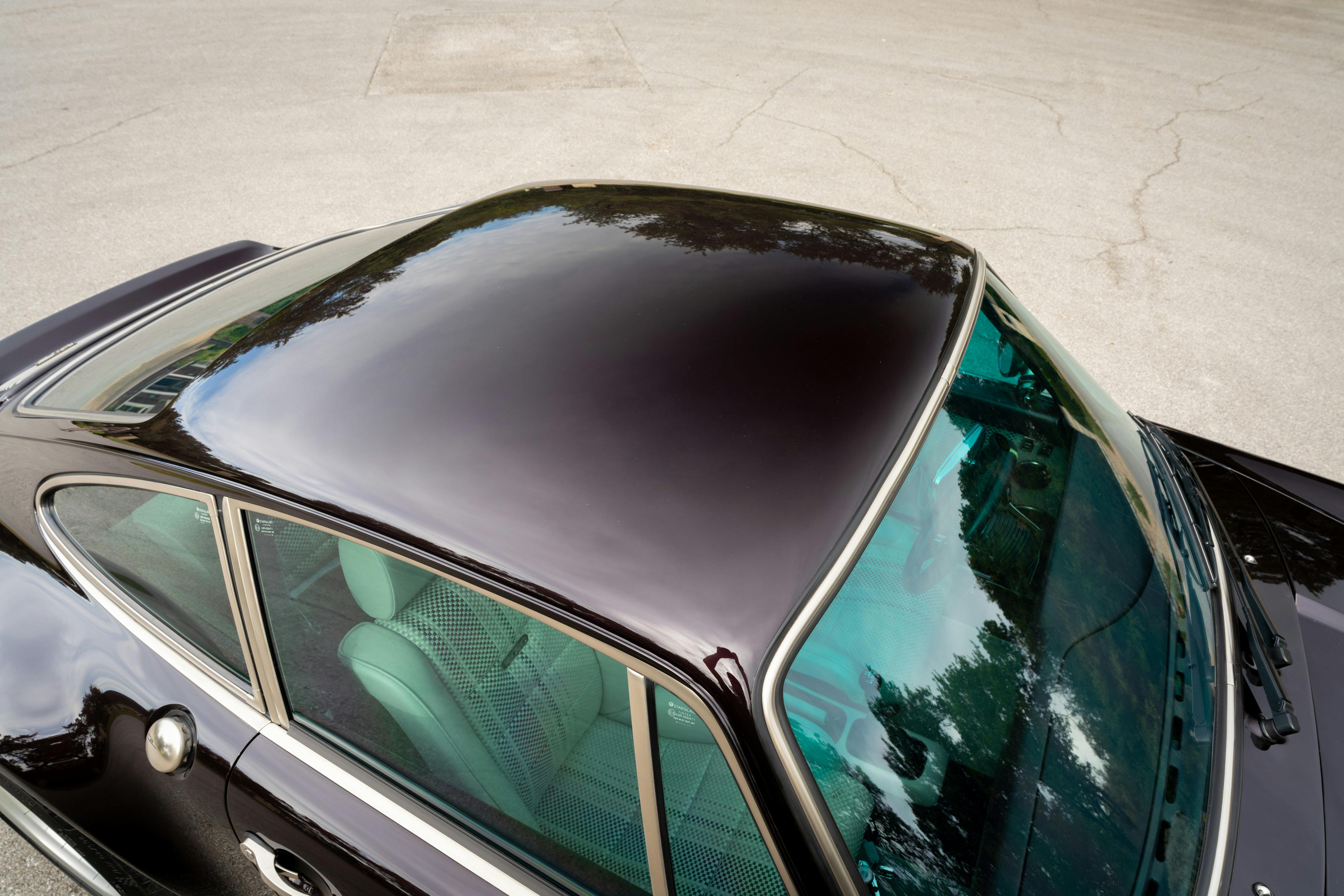 1990 Singer Porsche 911 Carrera 2 "Austin" commission in Aubergine Metallic shot in Austin, TX for a Bring a Trailer auction.