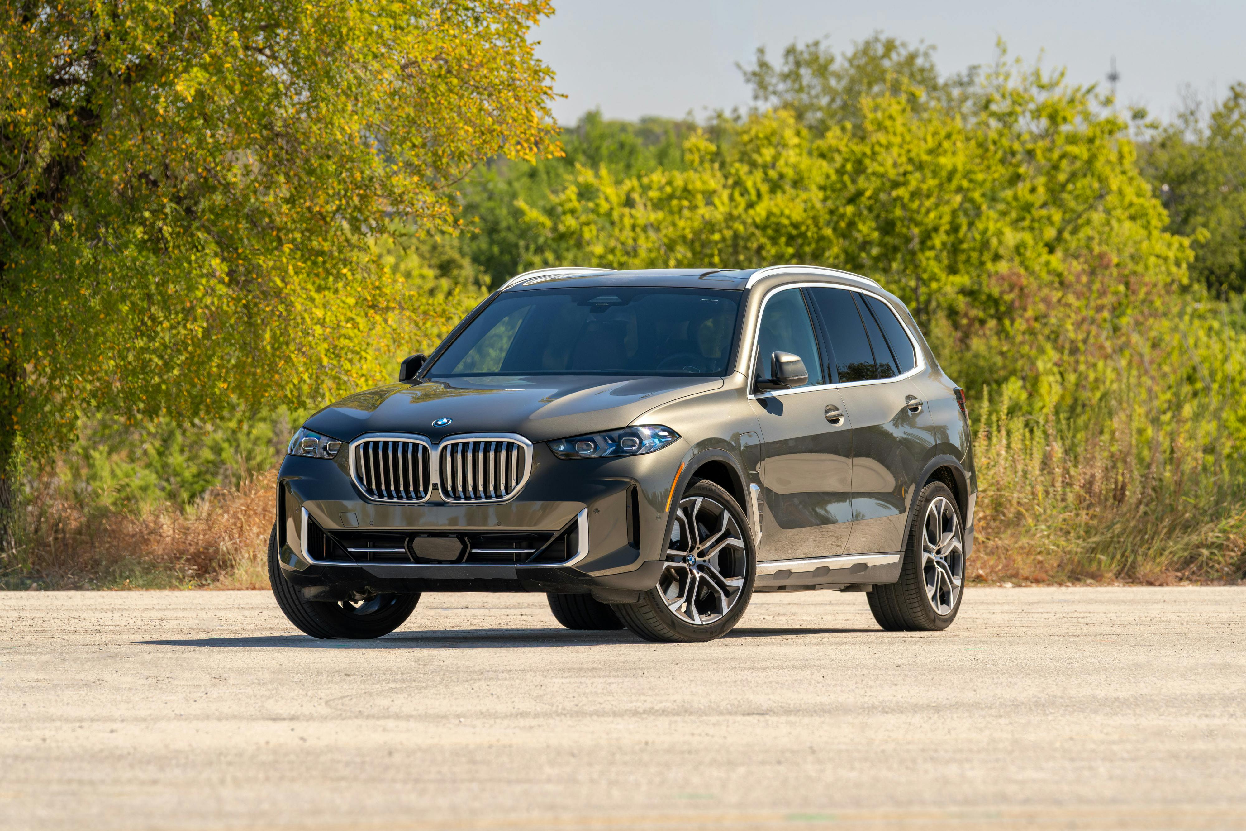 2026 BMW X5 in Manhattan Green Metallic shot in Austin, TX for a Turo rental.