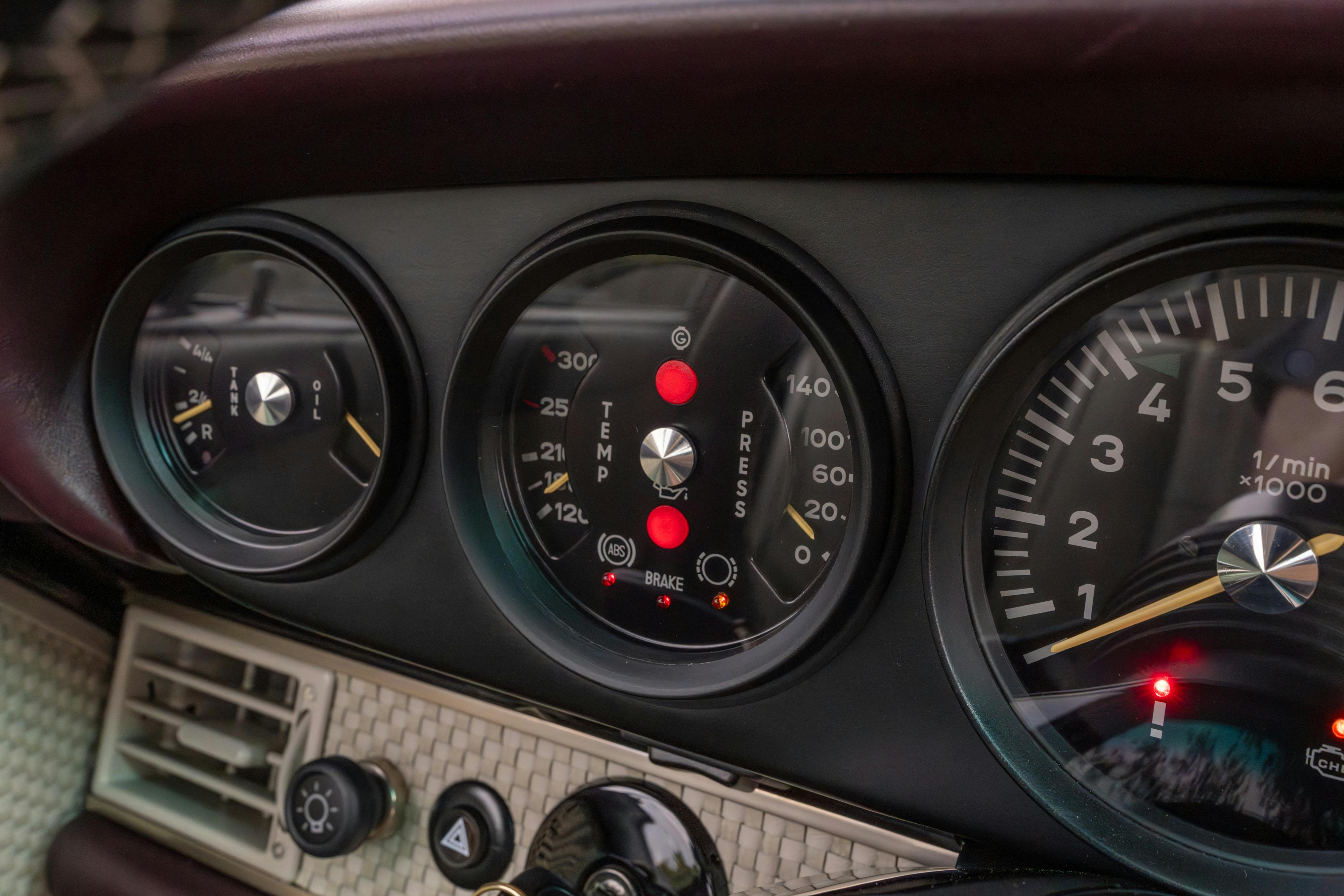 1990 Singer Porsche 911 Carrera 2 "Austin" commission in Aubergine Metallic shot in Austin, TX for a Bring a Trailer auction.