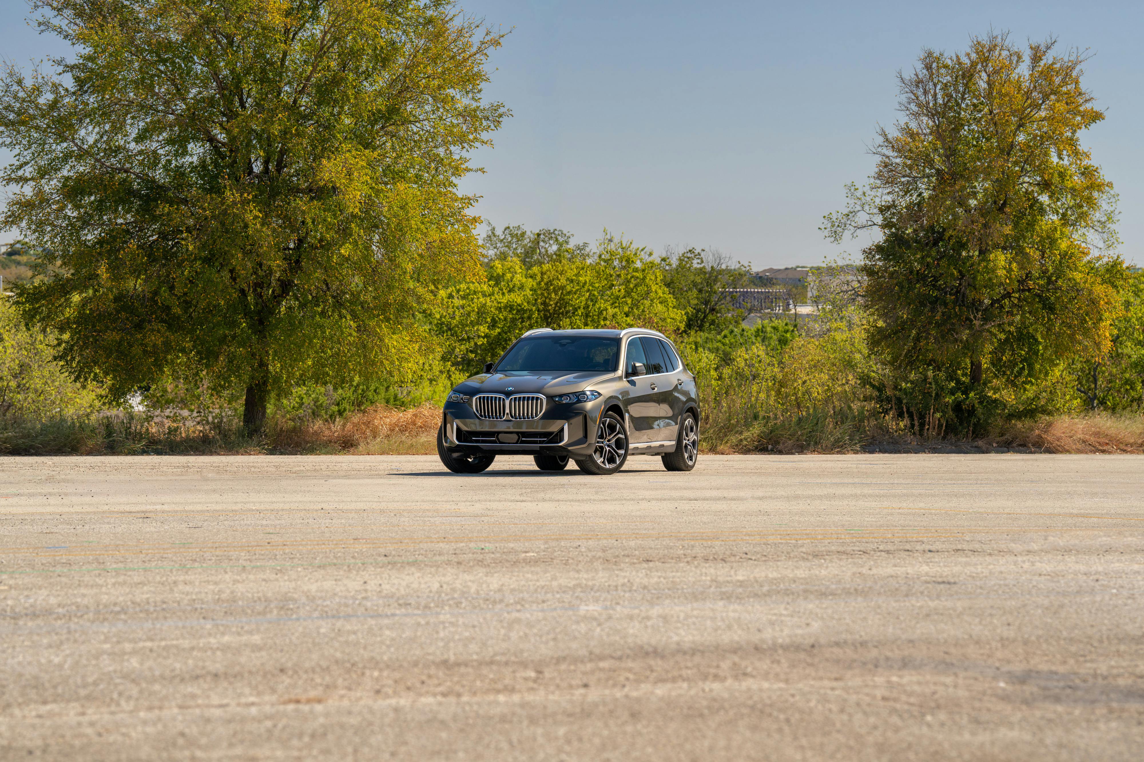 2026 BMW X5 in Manhattan Green Metallic shot in Austin, TX for a Turo rental.