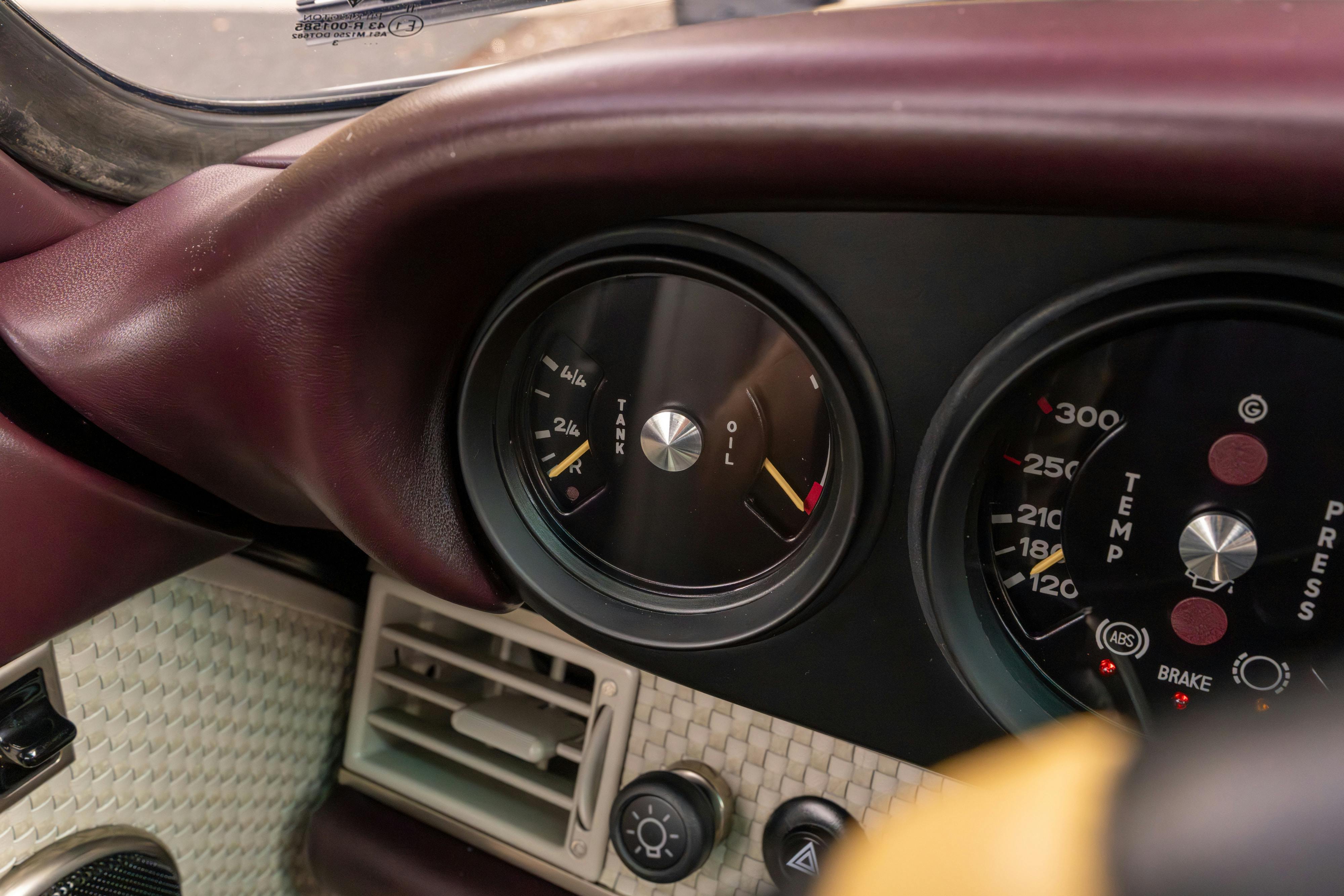 1990 Singer Porsche 911 Carrera 2 "Austin" commission in Aubergine Metallic shot in Austin, TX for a Bring a Trailer auction.