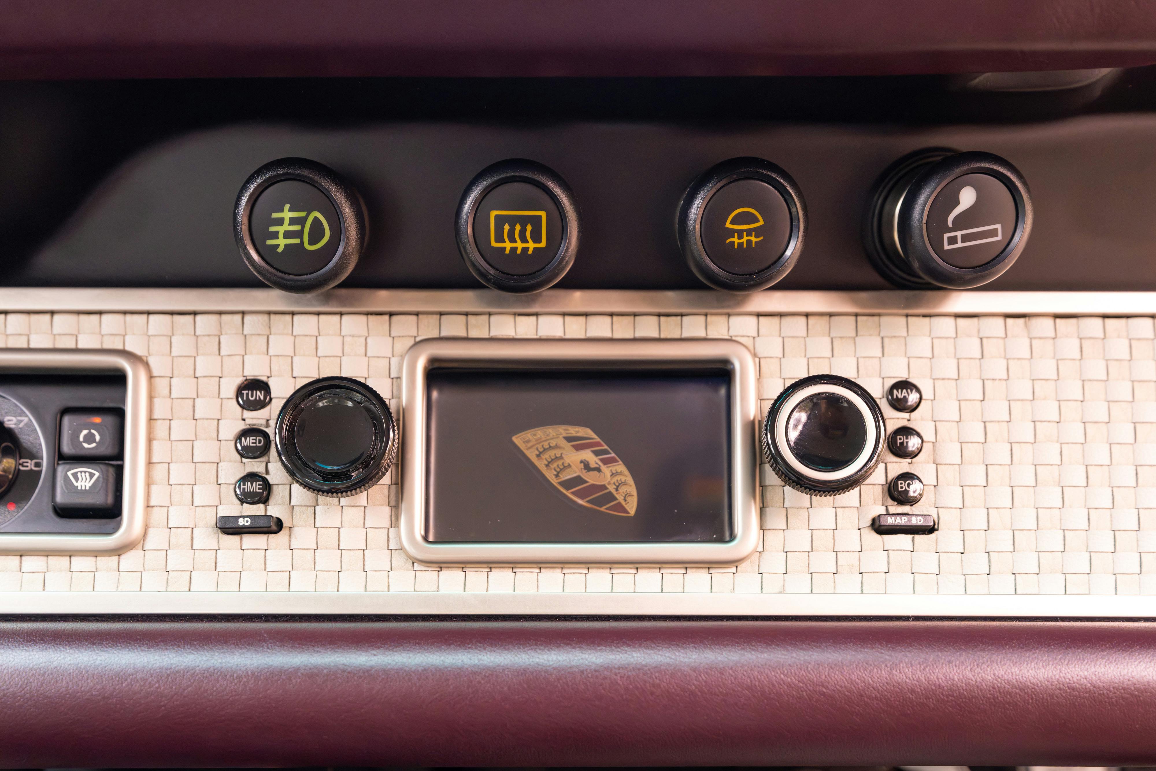 1990 Singer Porsche 911 Carrera 2 "Austin" commission in Aubergine Metallic shot in Austin, TX for a Bring a Trailer auction.