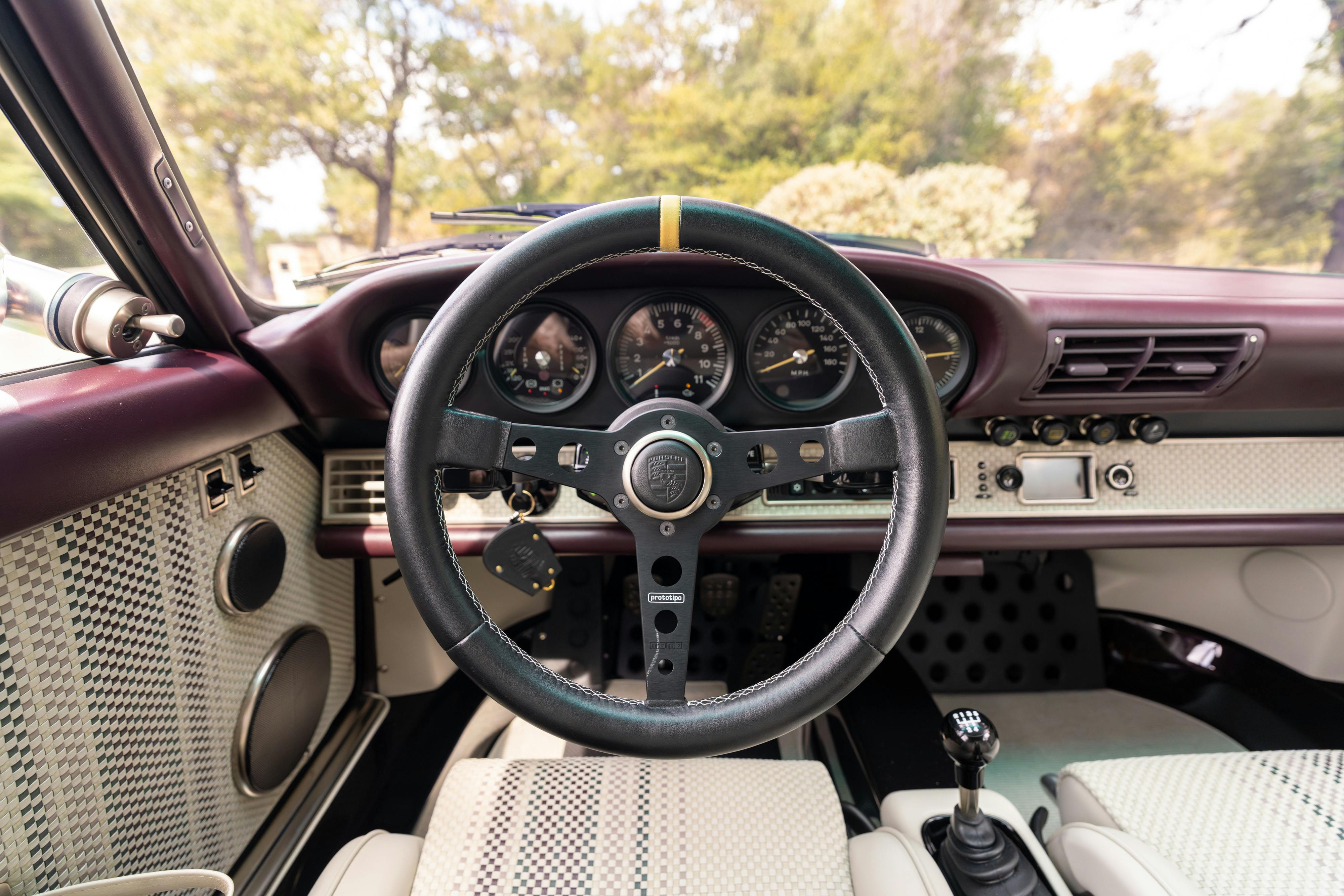 1990 Singer Porsche 911 Carrera 2 "Austin" commission in Aubergine Metallic shot in Austin, TX for a Bring a Trailer auction.
