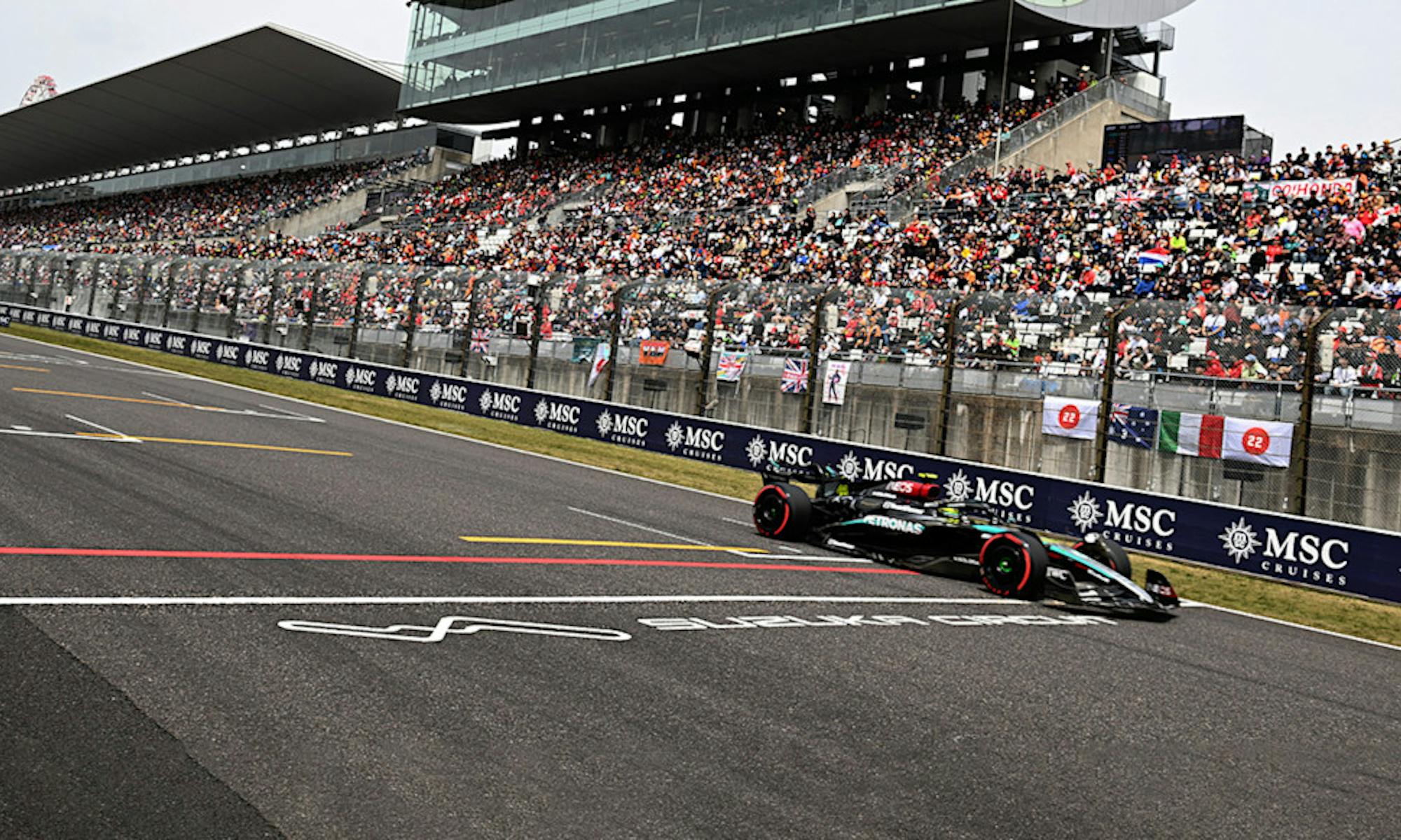 Strategy Switches and Teamwork on Educational Japanese GP Weekend
