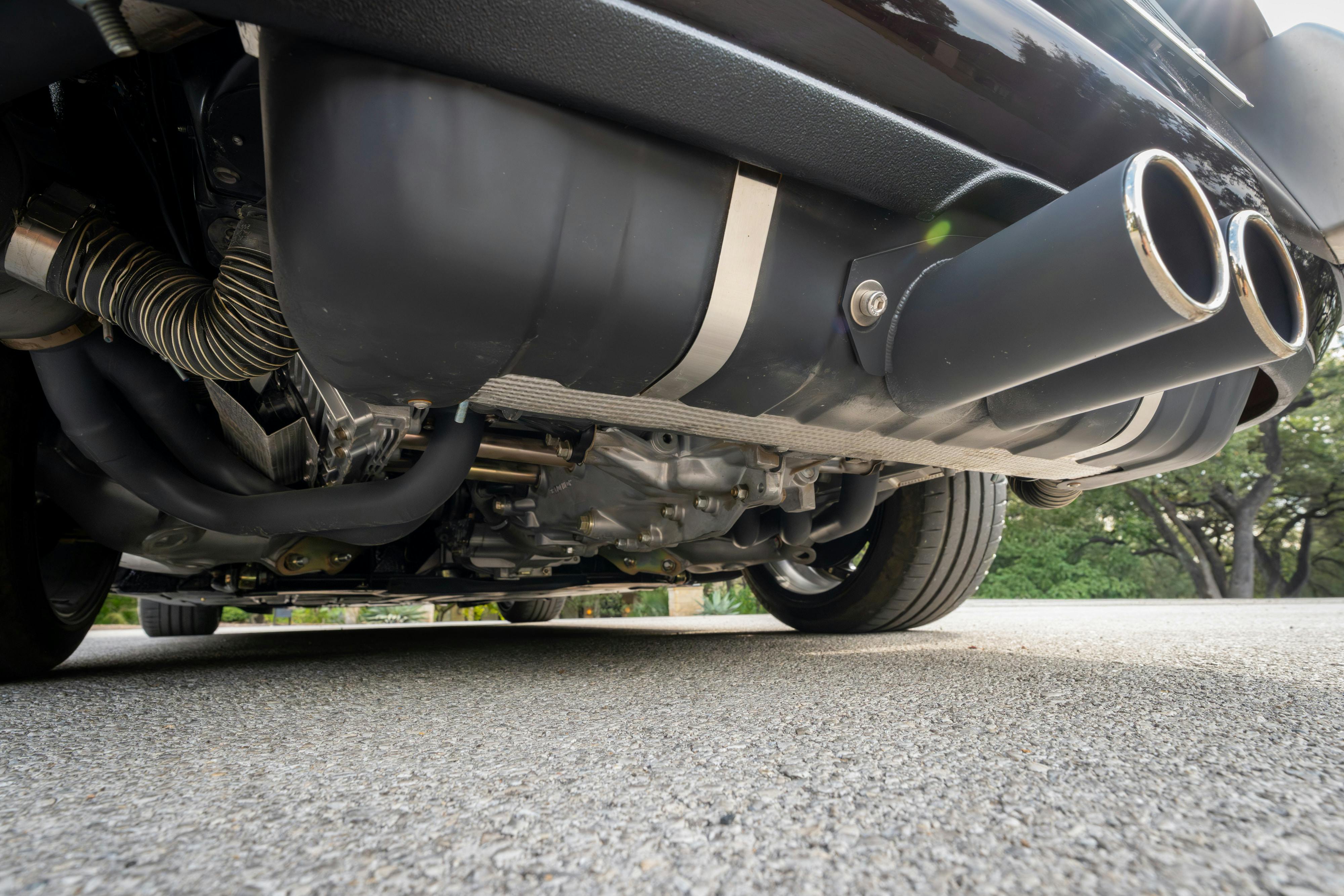 1990 Singer Porsche 911 Carrera 2 "Austin" commission in Aubergine Metallic shot in Austin, TX for a Bring a Trailer auction.