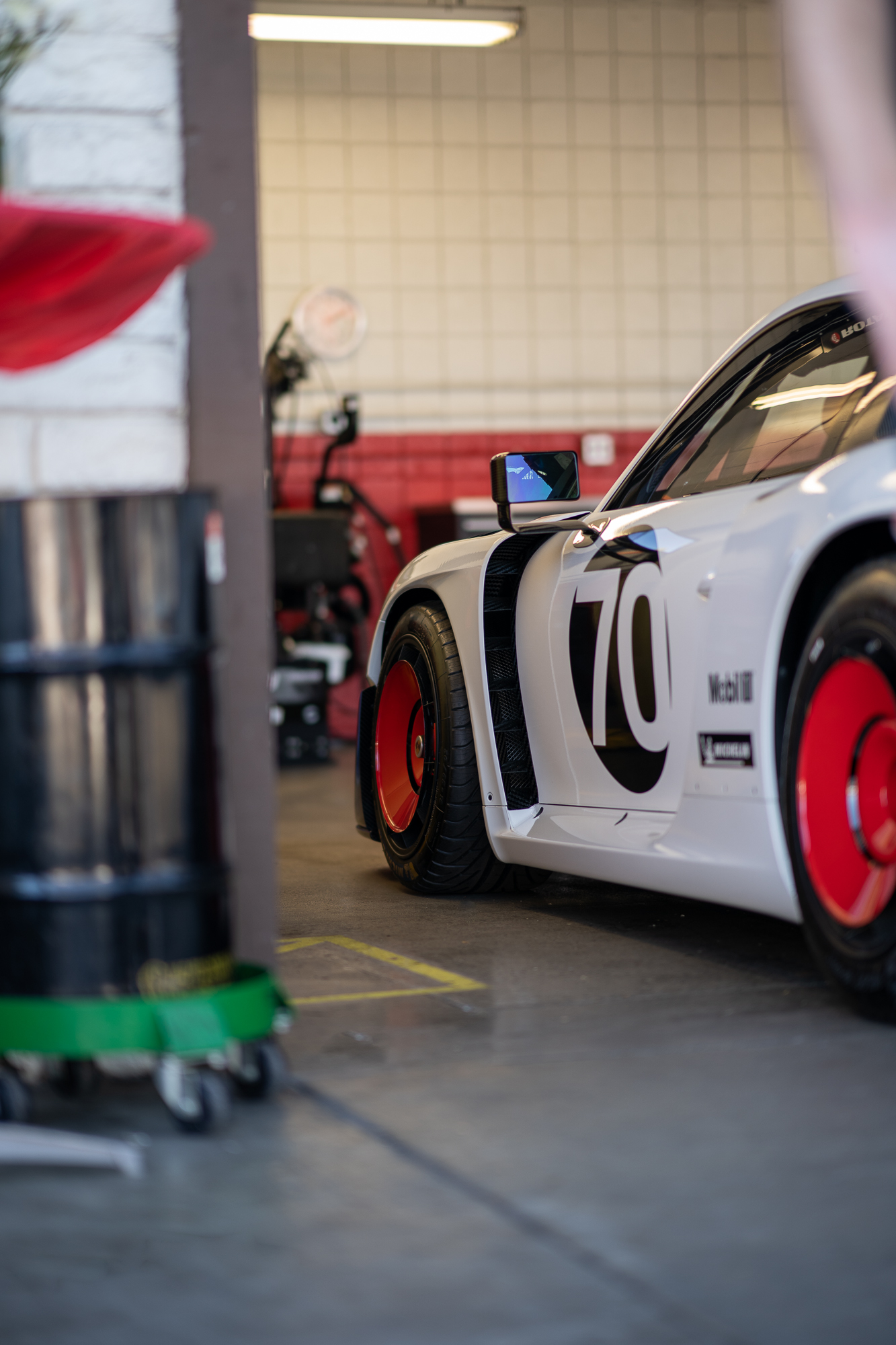 A 935 racecar waiting in a garage at Callas Rennsport