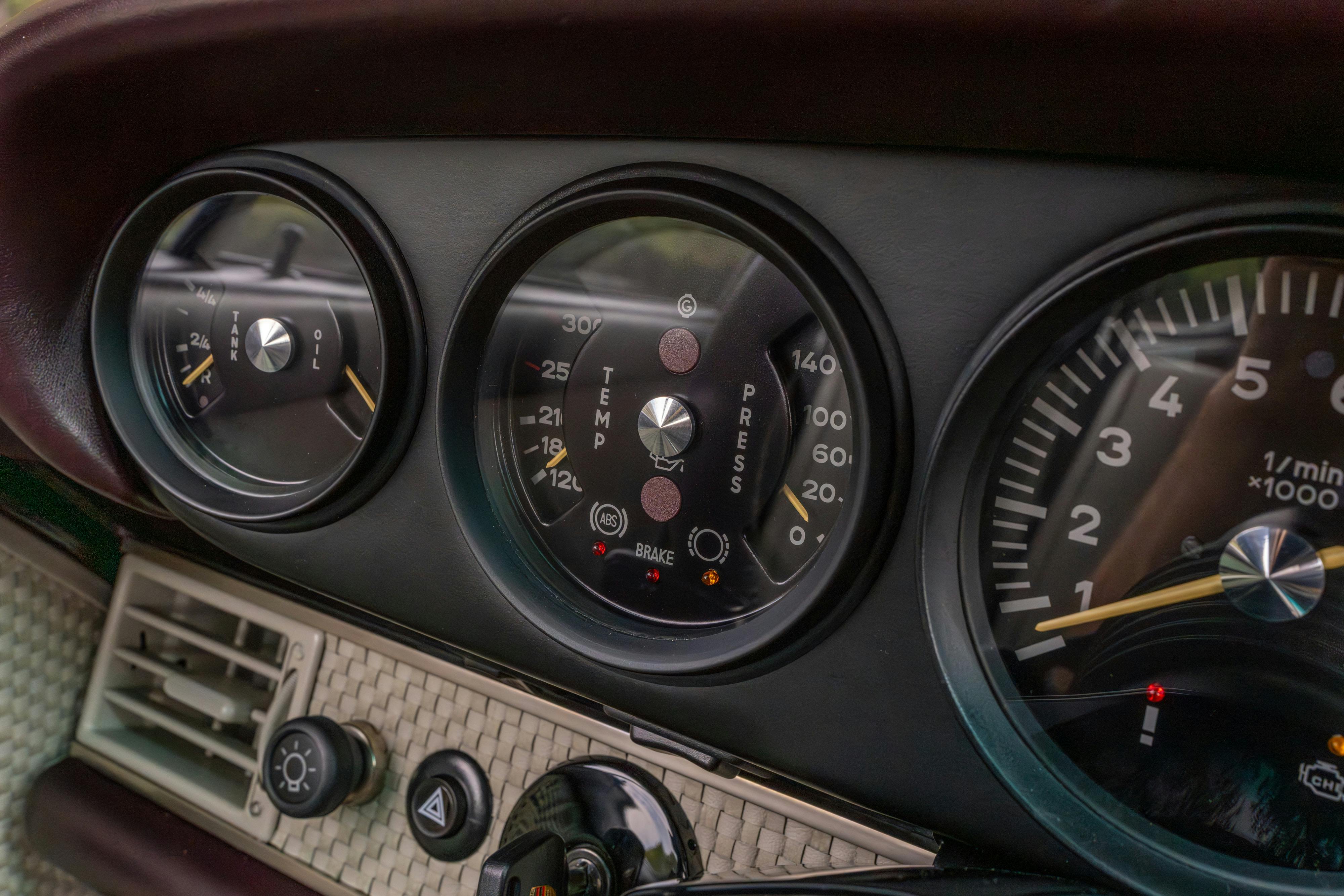 1990 Singer Porsche 911 Carrera 2 "Austin" commission in Aubergine Metallic shot in Austin, TX for a Bring a Trailer auction.