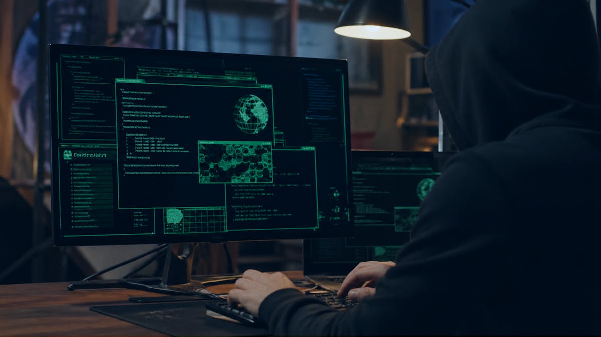 Computer screen with Tor browser logo and encrypted network connections visualization, representing dark web access.