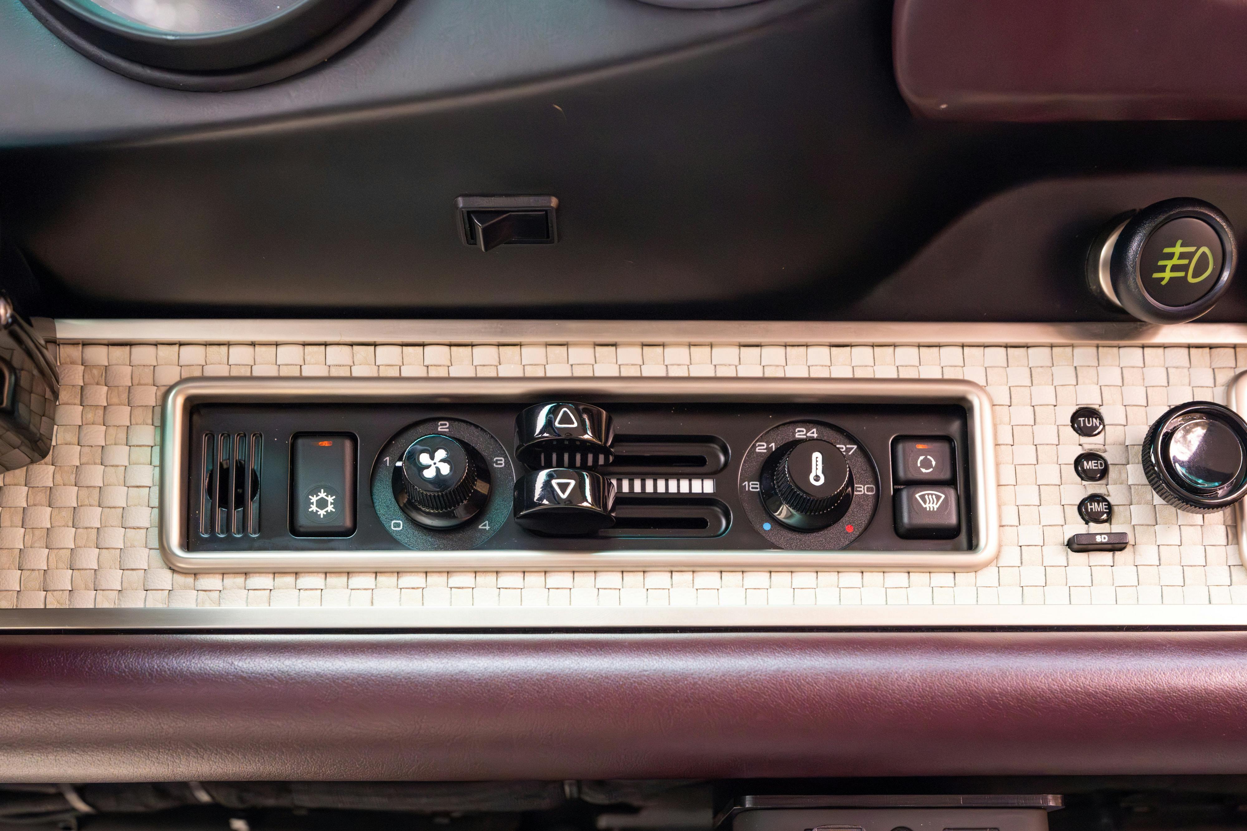 1990 Singer Porsche 911 Carrera 2 "Austin" commission in Aubergine Metallic shot in Austin, TX for a Bring a Trailer auction.