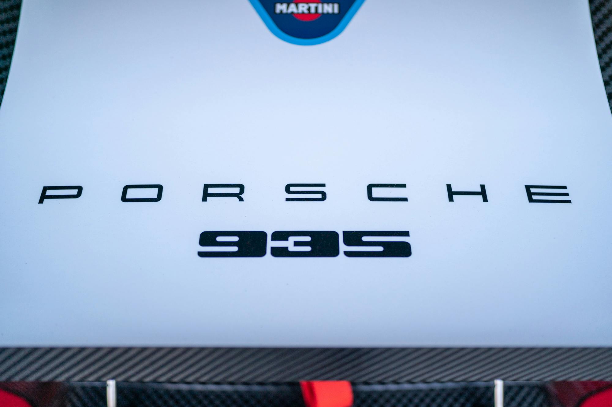Porsche logo on the rear of a 2019 935