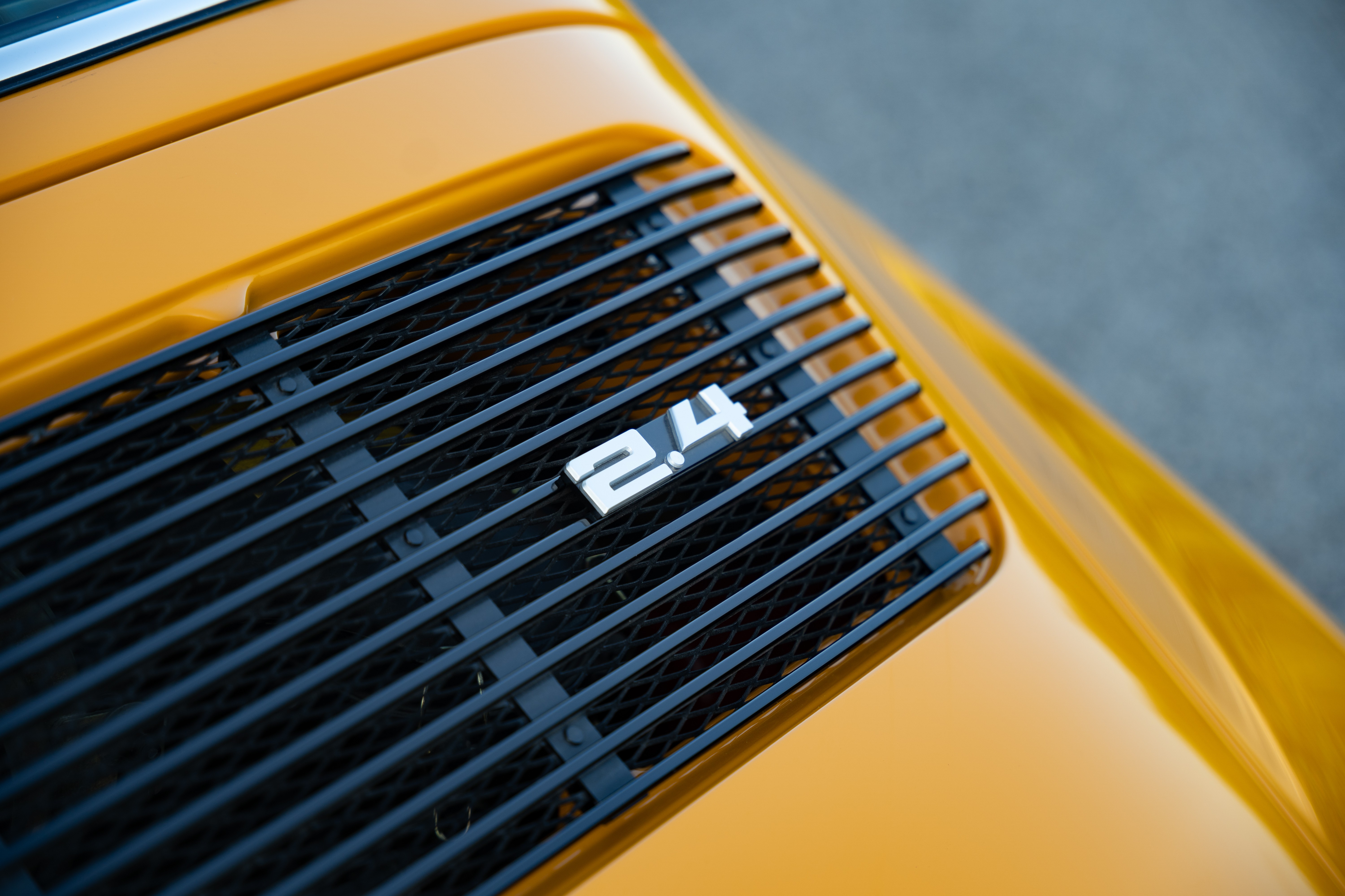 A Signal Yellow 1973 Porsche 911S Targa with brown interior in Austin, TX.