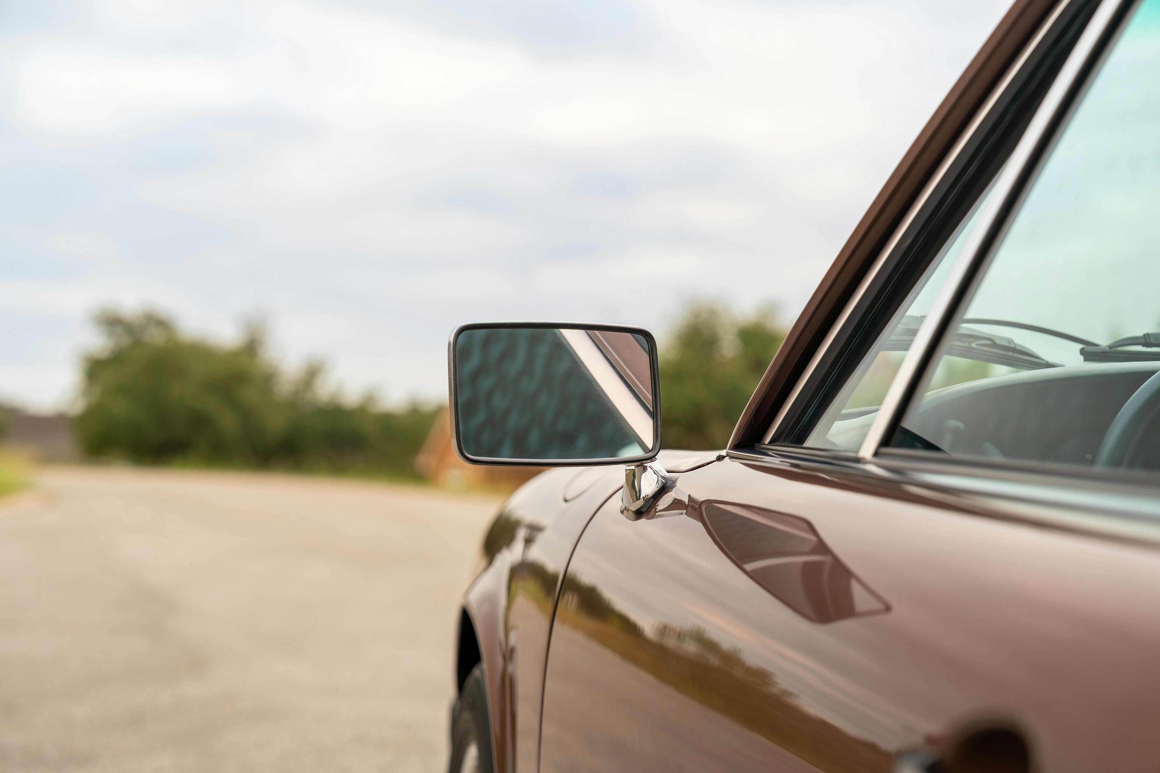 1975 Porsche 911 Carrera 2.7 in Copper Brown Metallic with beige interior for auction on Bring a Trailer.