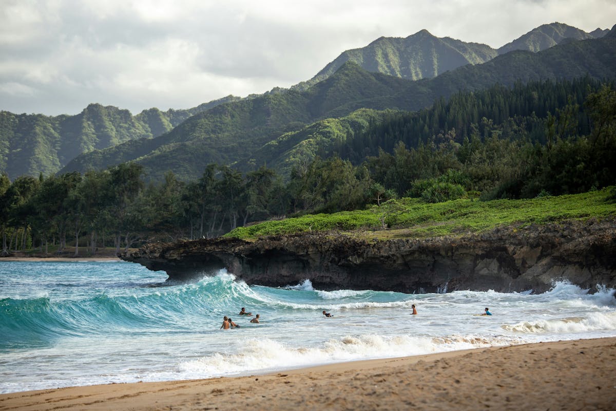 Beach with people in the water