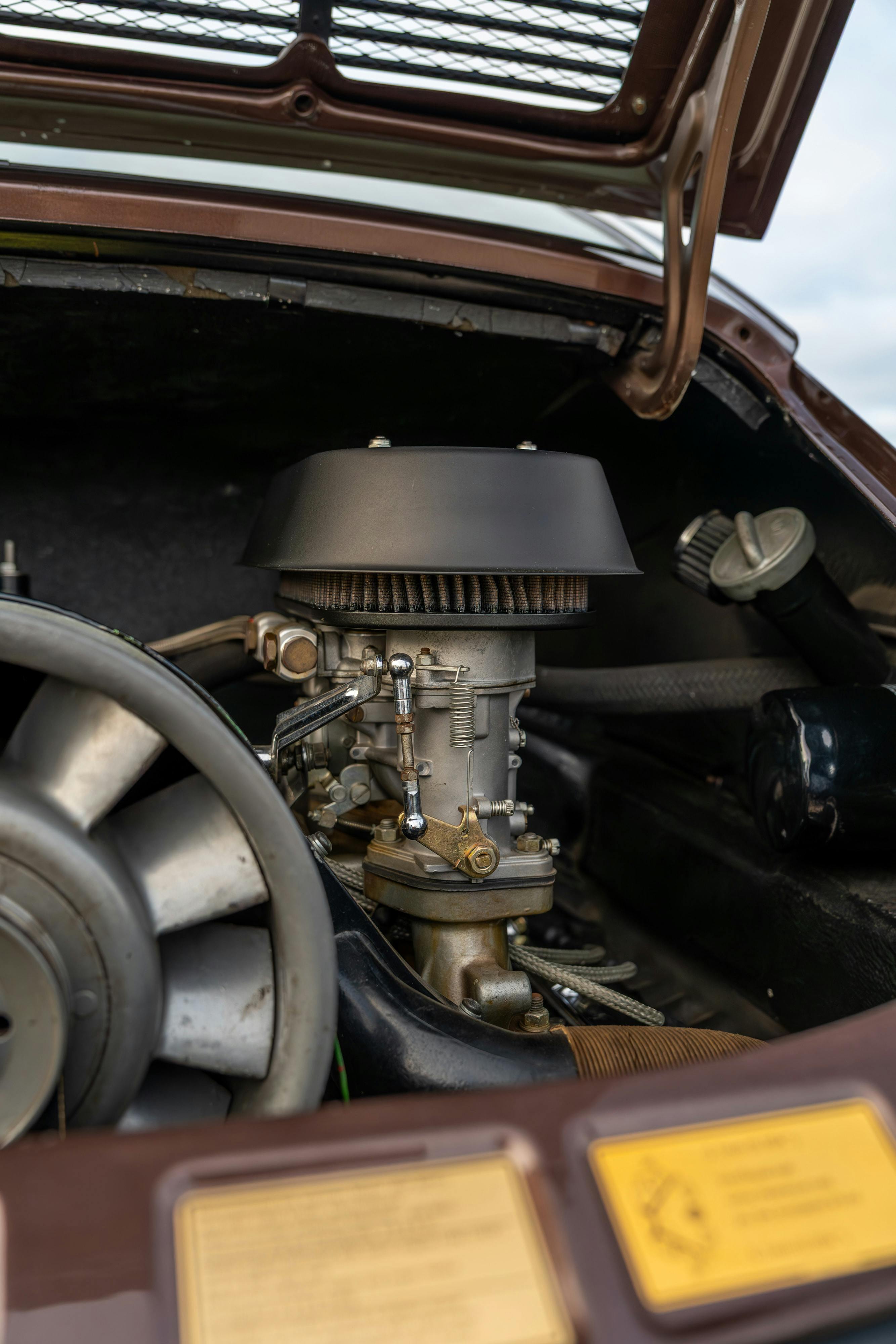 1975 Porsche 911 Carrera 2.7 in Copper Brown Metallic with beige interior for auction on Bring a Trailer.